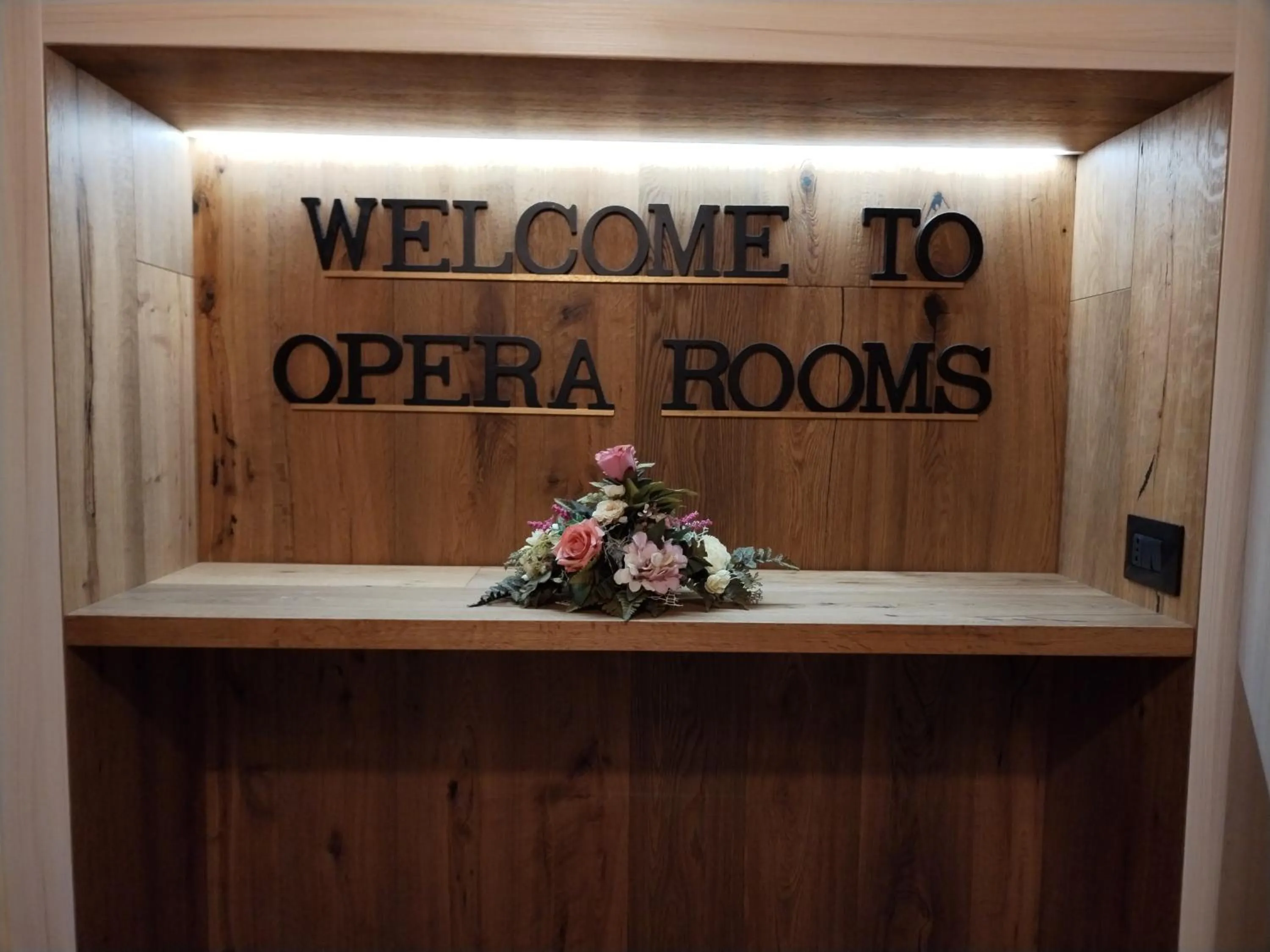 Property logo or sign in L'OPERA ROOMS