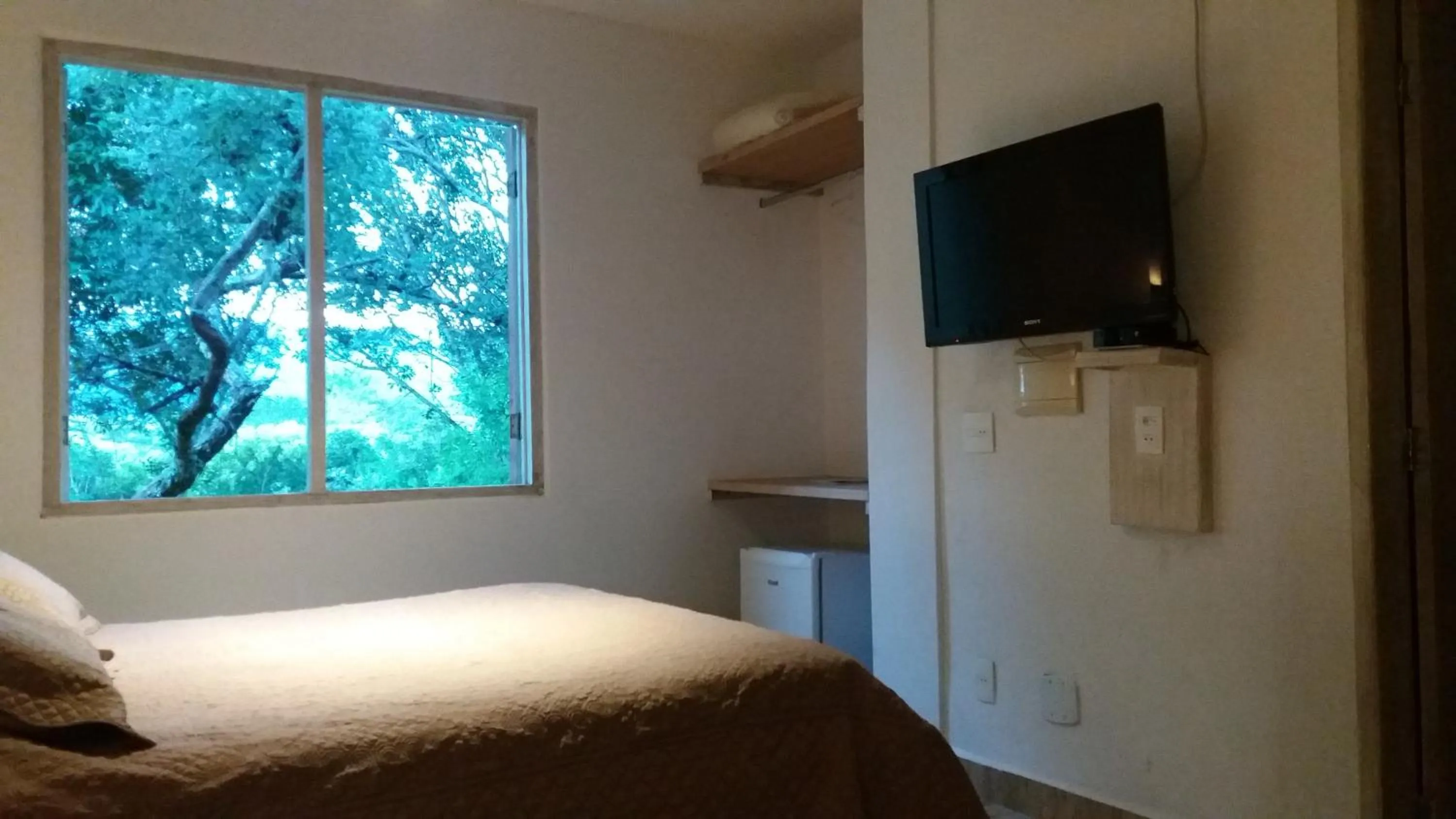 Bed in Pousada Cantares