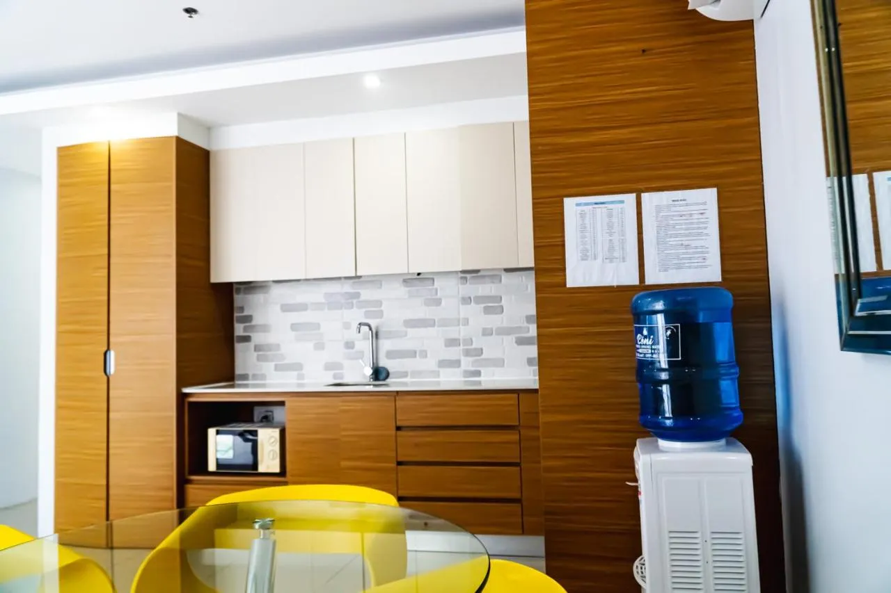 Kitchen or kitchenette in Chequers Suites Subic Bay