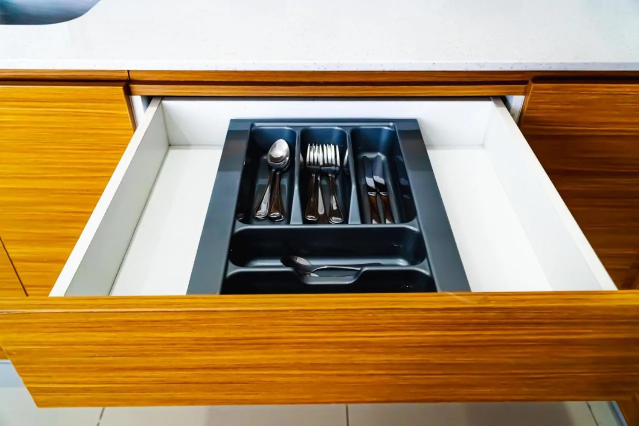 Kitchen or kitchenette in Chequers Suites Subic Bay