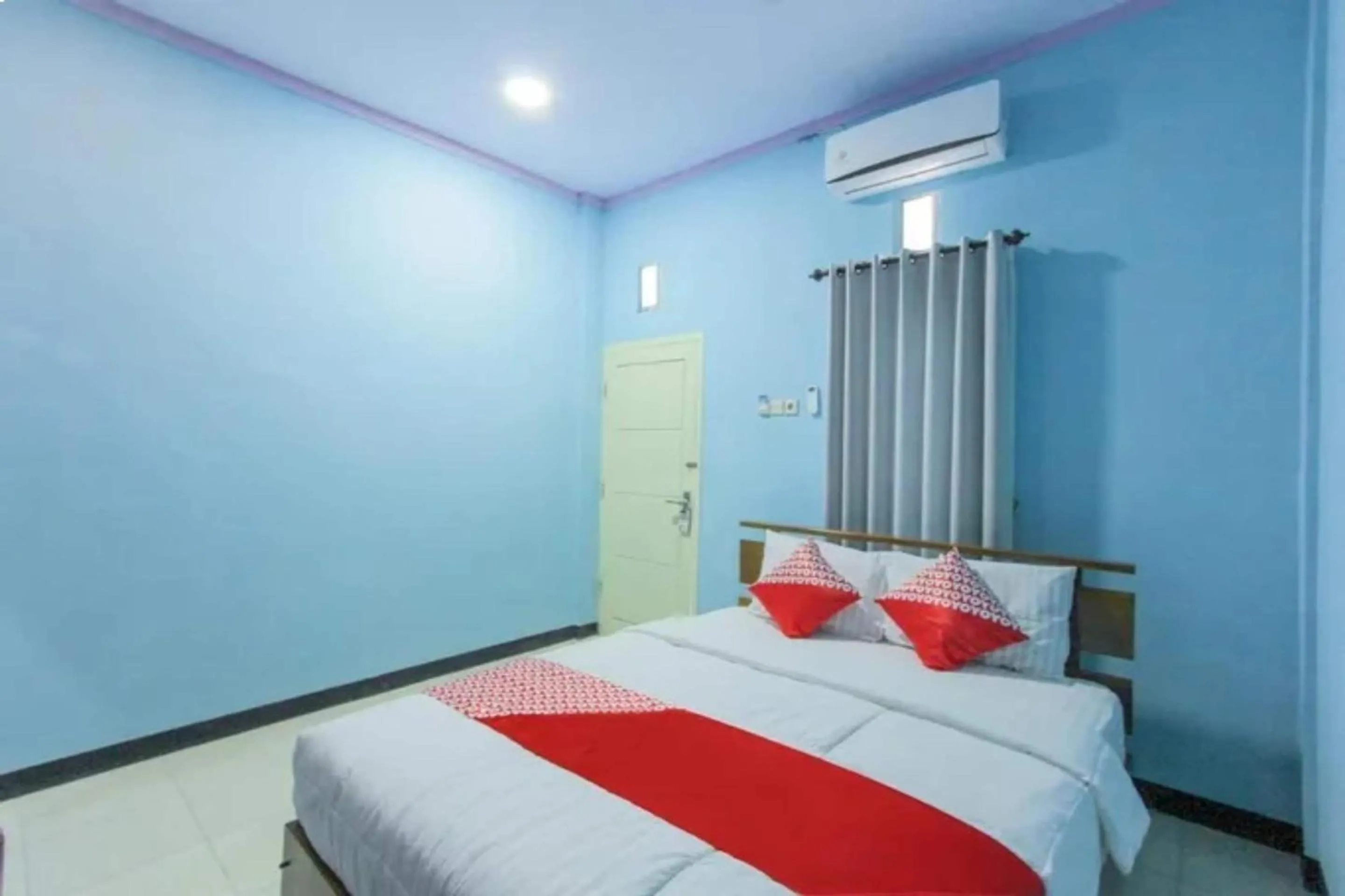 Bedroom in Hotel O Asipra House