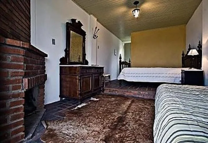 Bed in Pousada Chácara das Roseiras