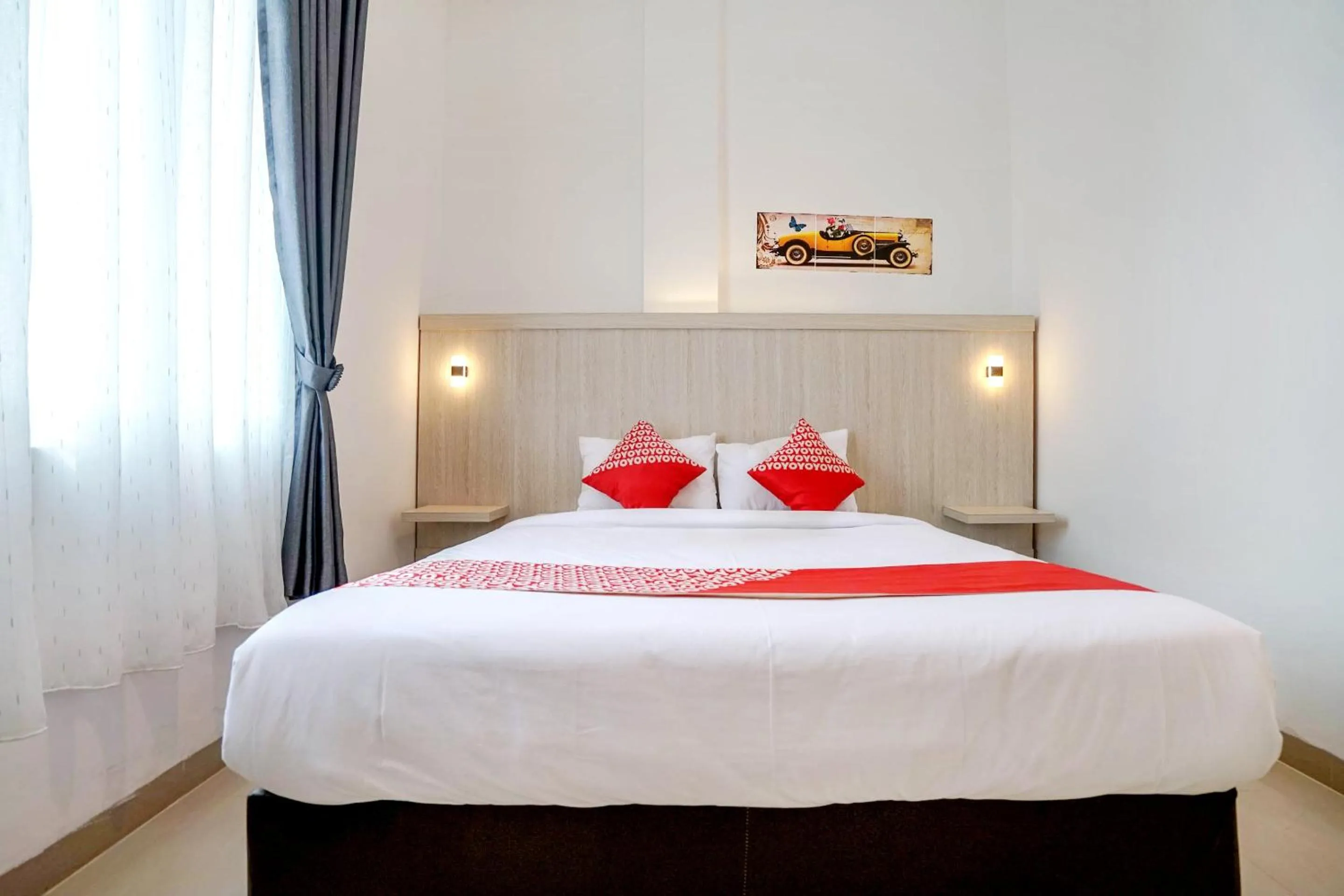 Bedroom in OYO Life 1299 Balcony Orange Homestay