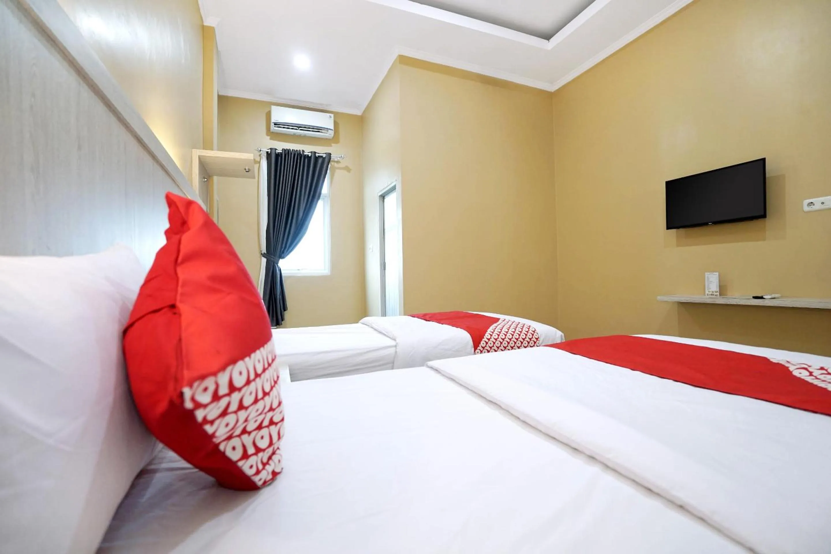 Bedroom in OYO Life 1299 Balcony Orange Homestay