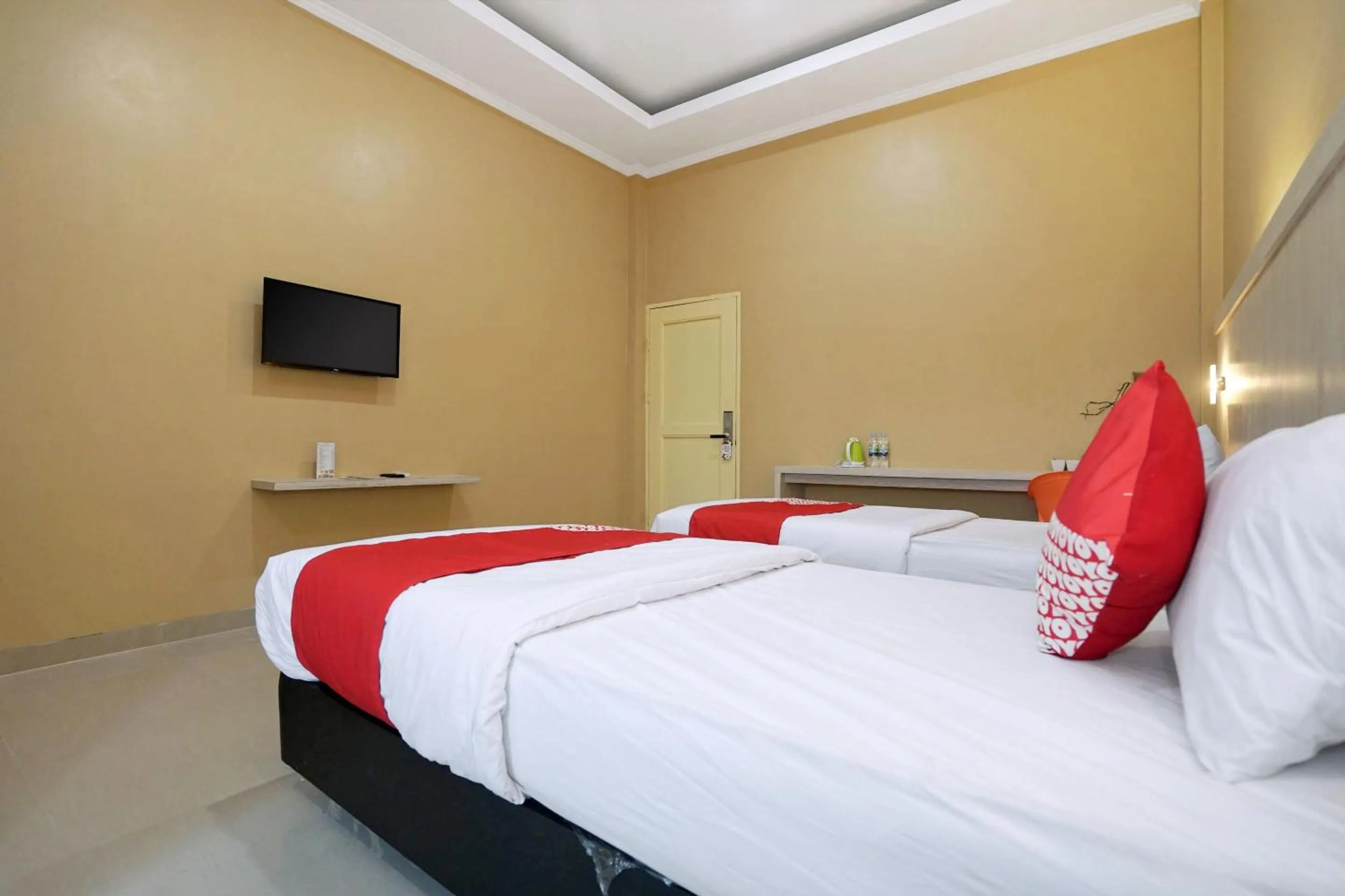 Bedroom in OYO Life 1299 Balcony Orange Homestay