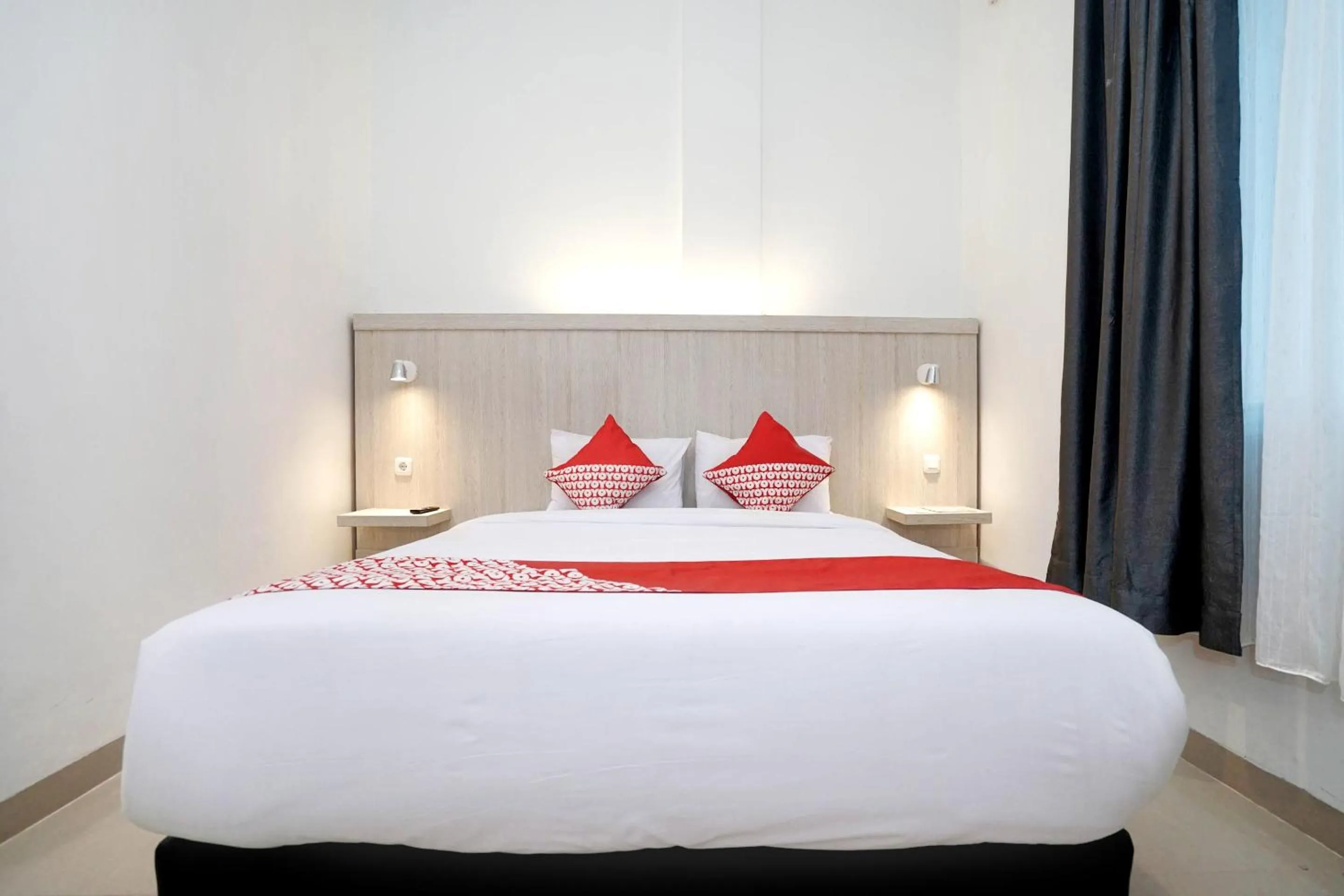 Bedroom in OYO Life 1299 Balcony Orange Homestay