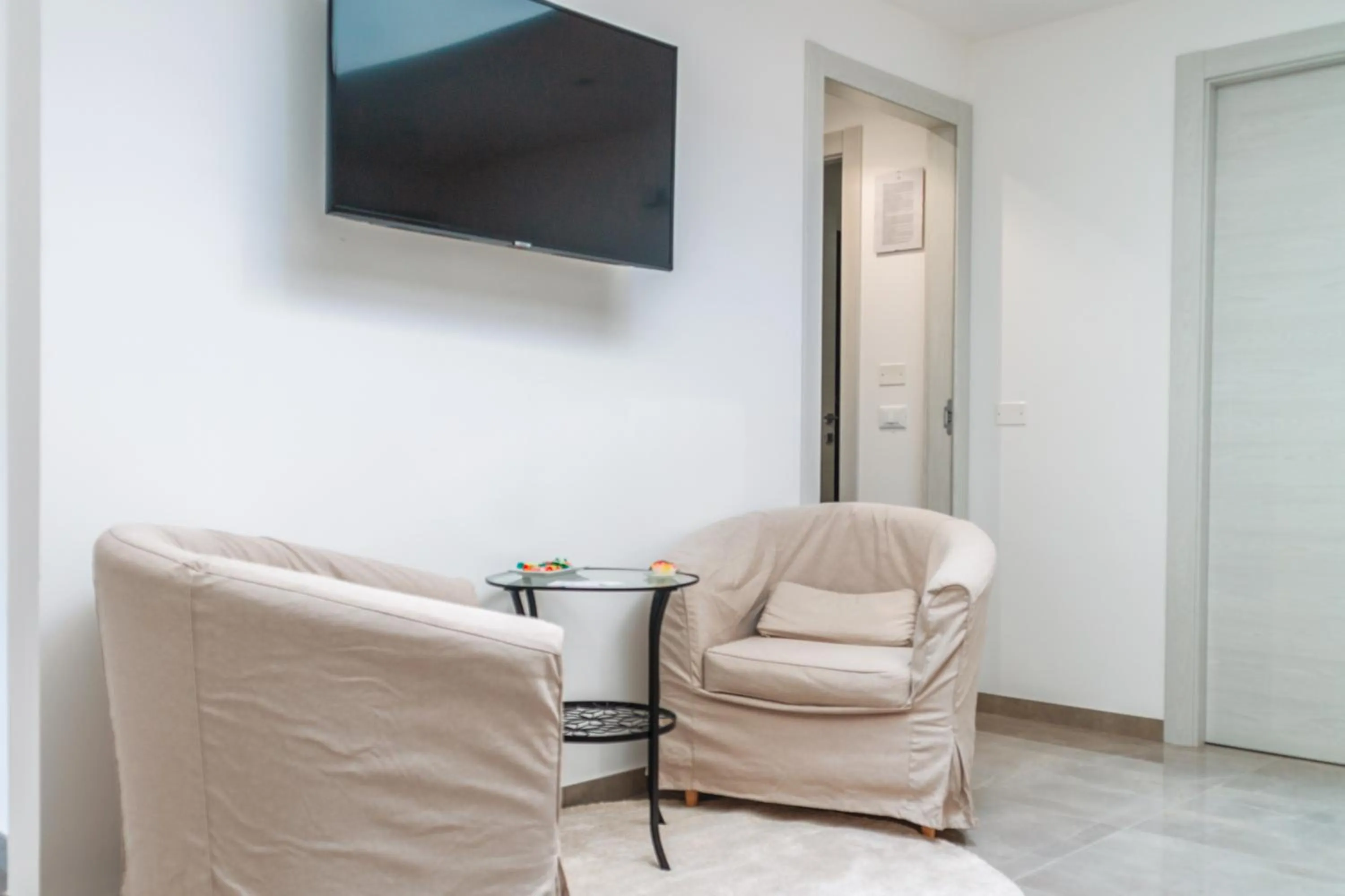 Communal lounge/ TV room in Mediterraneo Palace Luxury Affittacamere