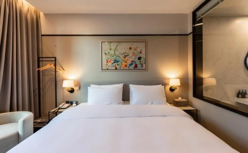 Bed in Brown Dot Hotel Deokcheon