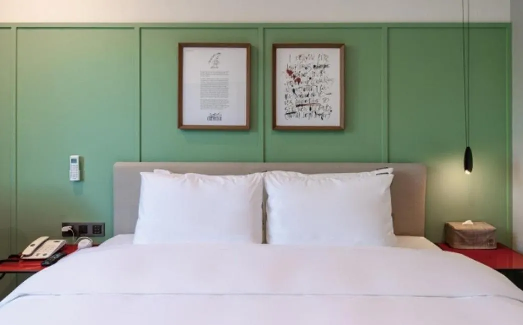 Bed in Brown Dot Hotel Deokcheon