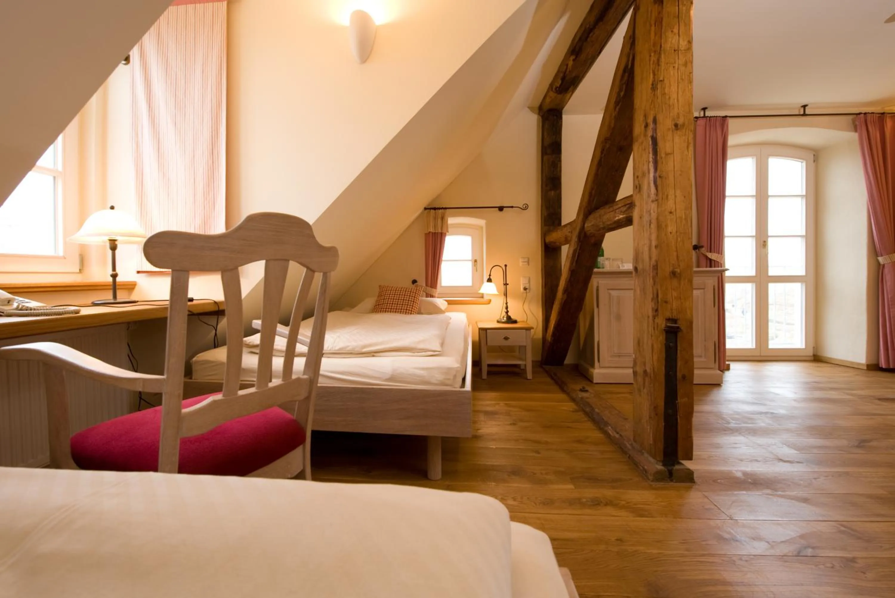 Photo of the whole room, Bed in Hotel Gutshaus Parin - Bio- und Gesundheitshotel