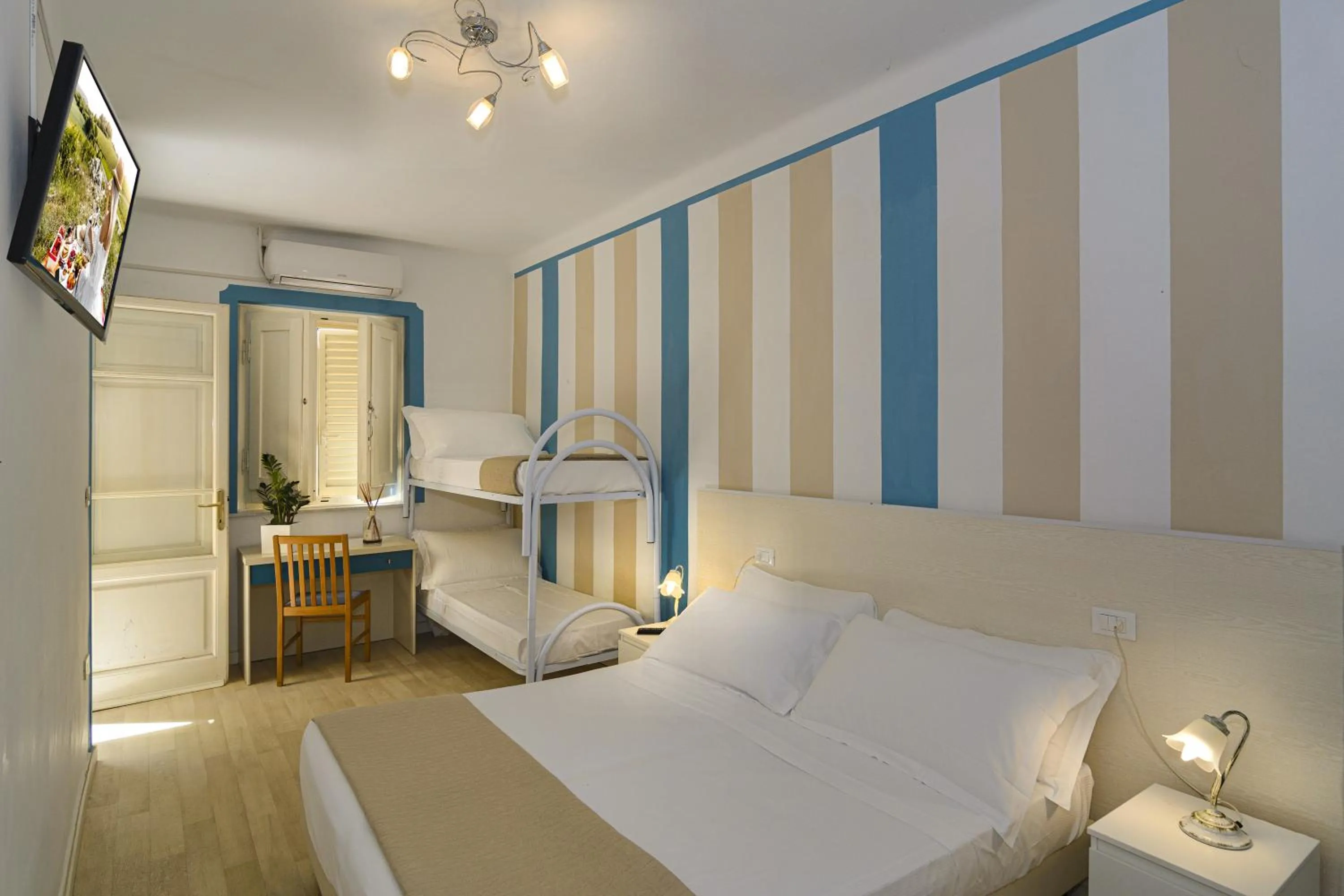 Standard Quadruple Room - Ground Floor in Hotel Lungomare