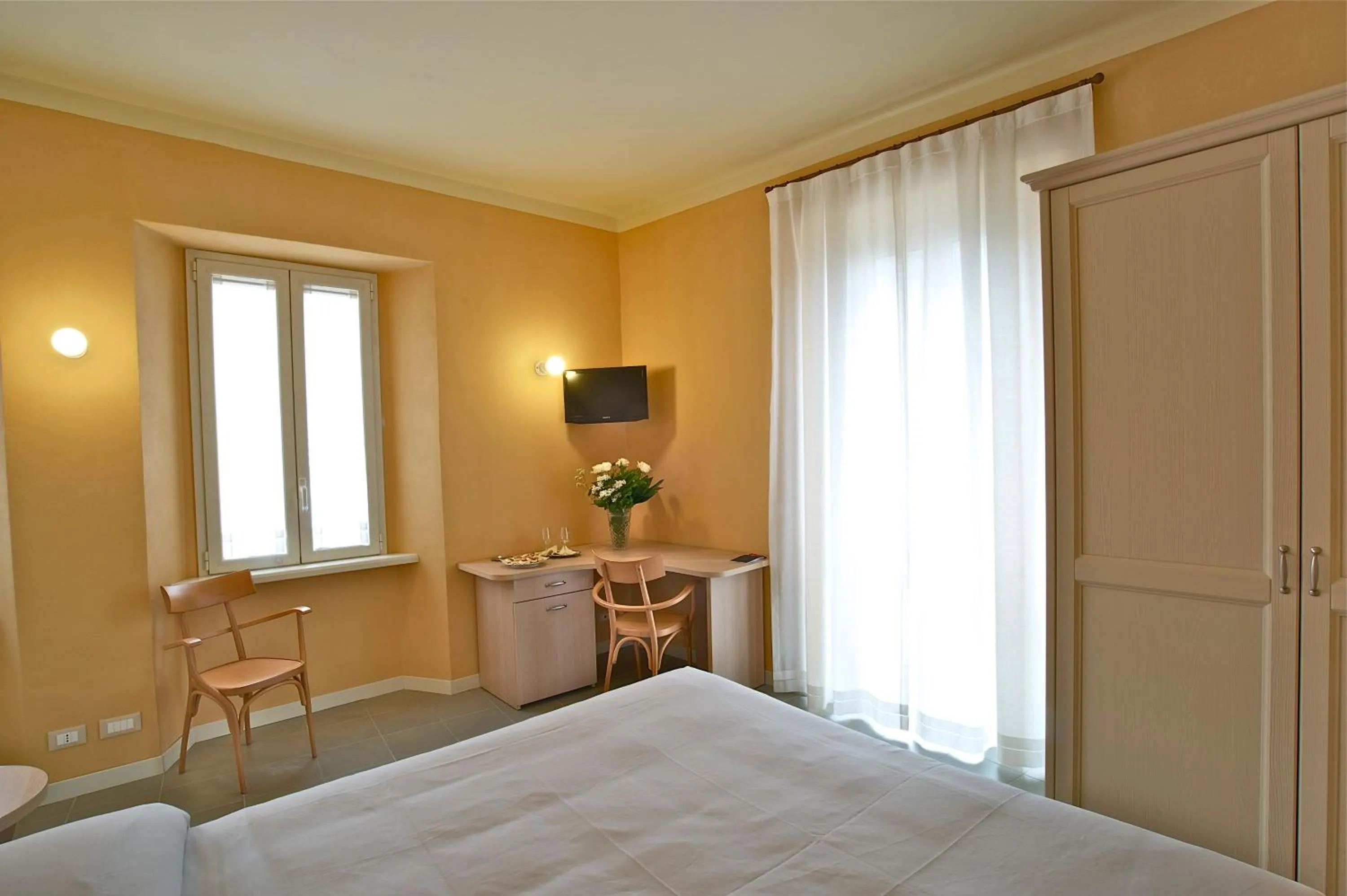 Photo of the whole room, Bed in Locanda della Maria