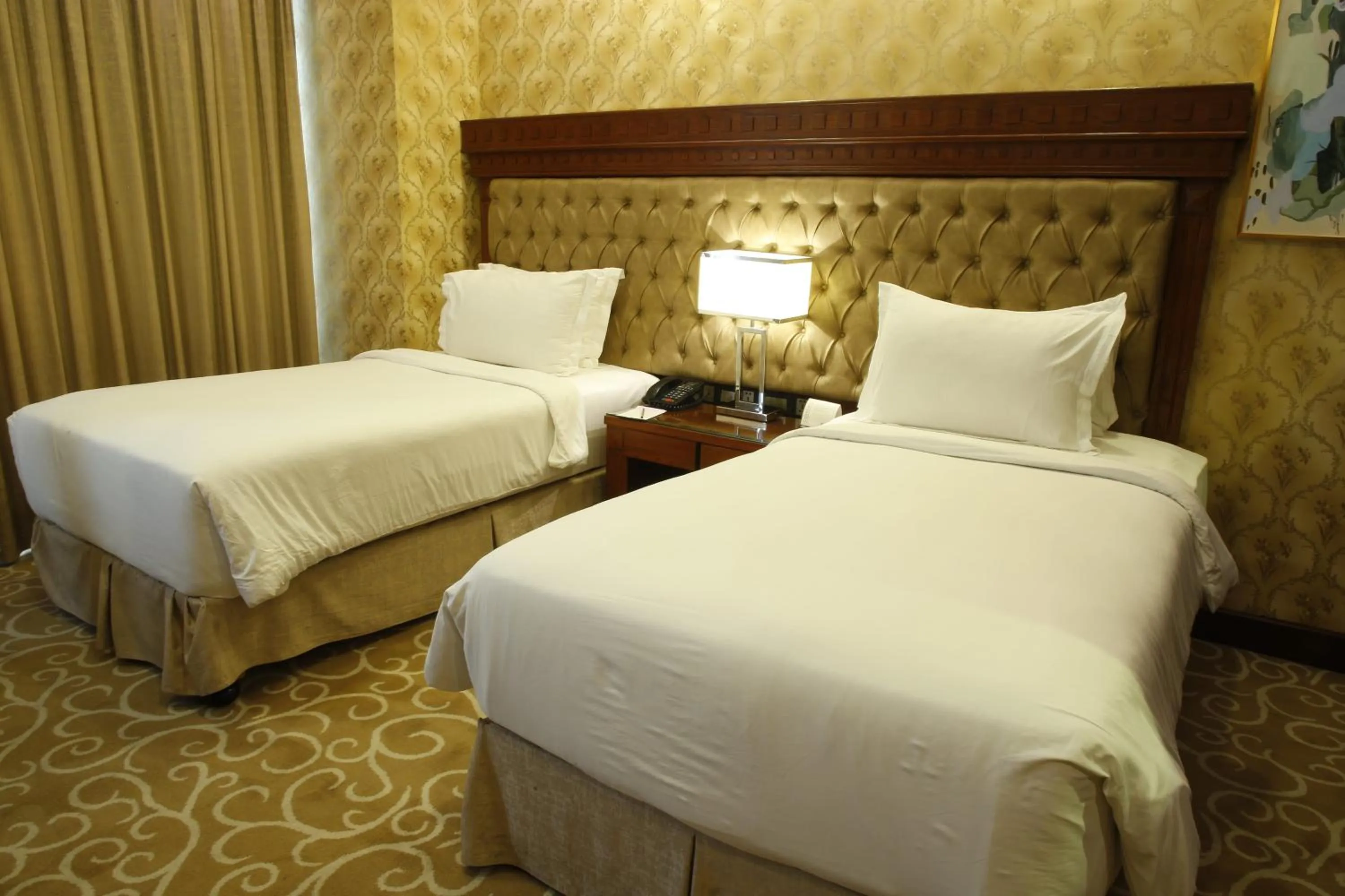 Bed in Royal Swiss Lahore