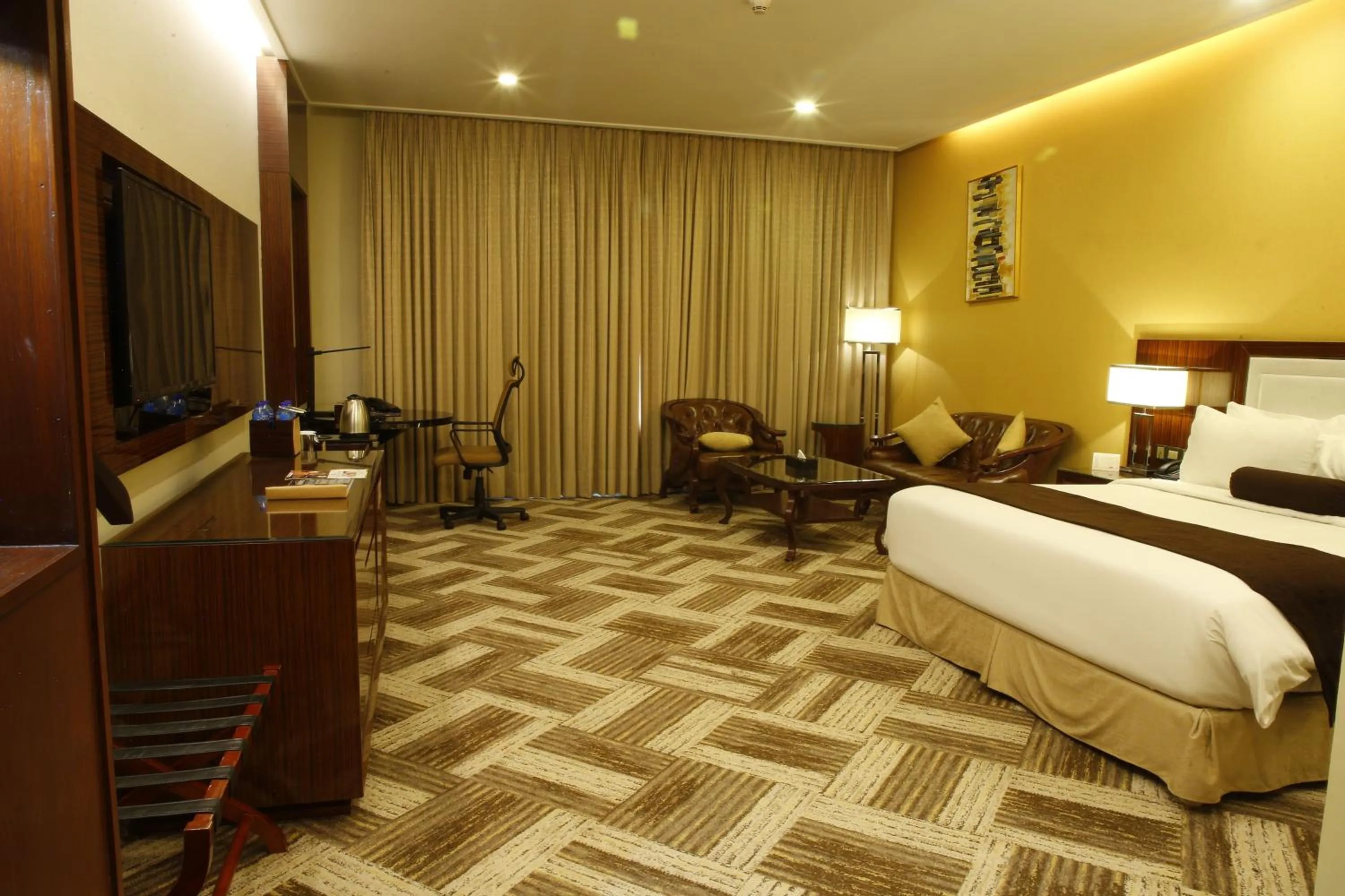 Bed in Royal Swiss Lahore