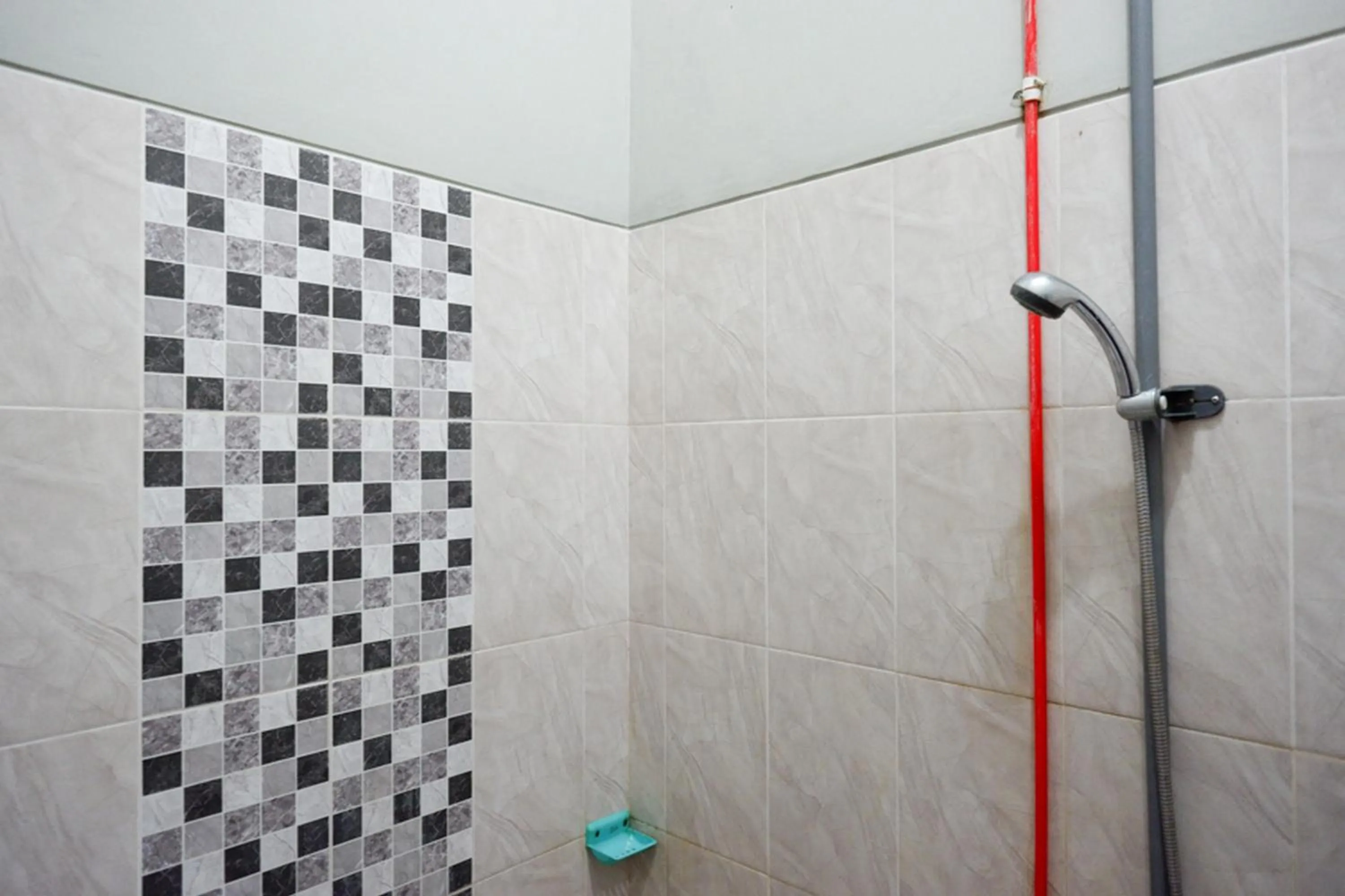 Bathroom in RedDoorz Syariah near Menara Kudus