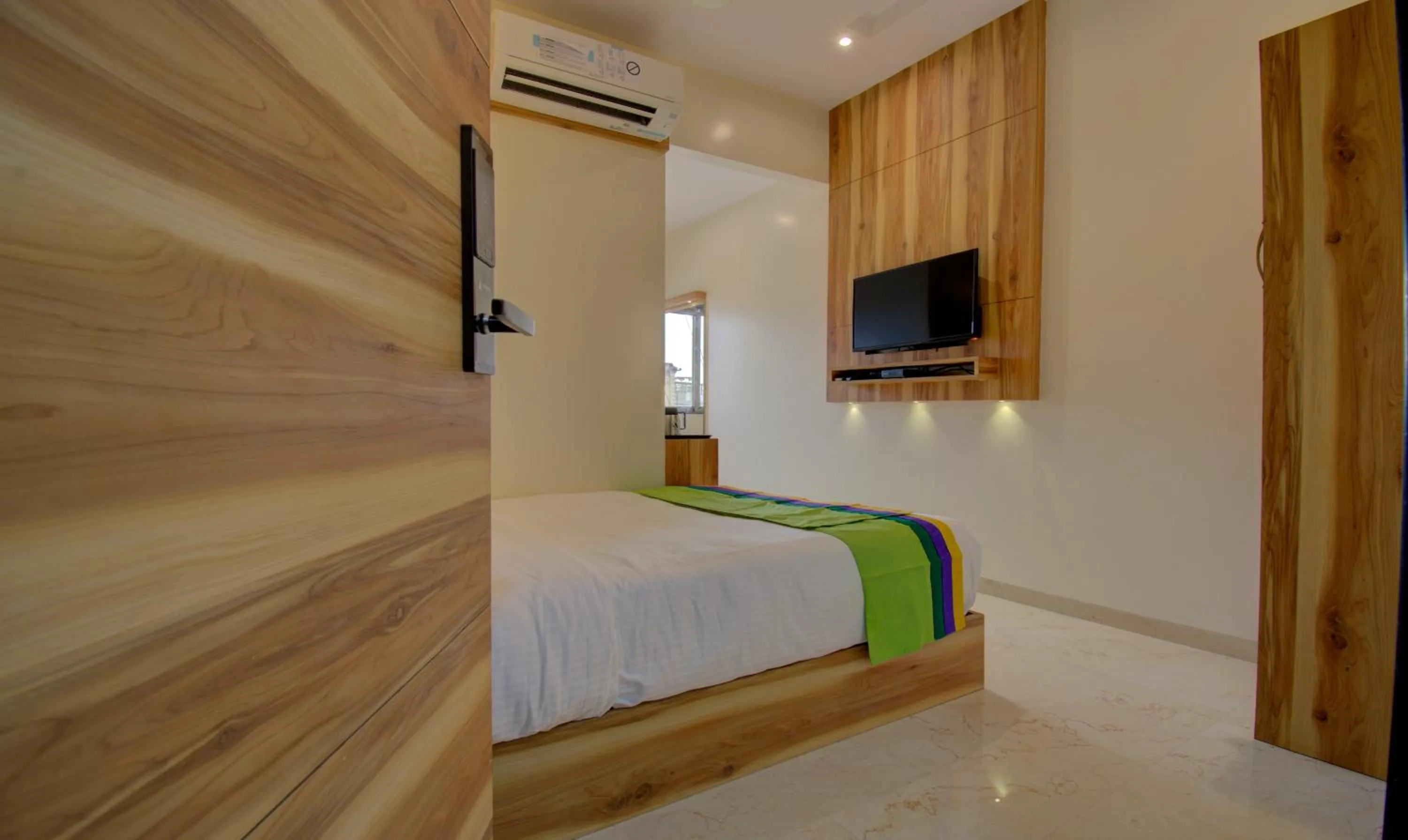 Bed in Hotel Amisha International