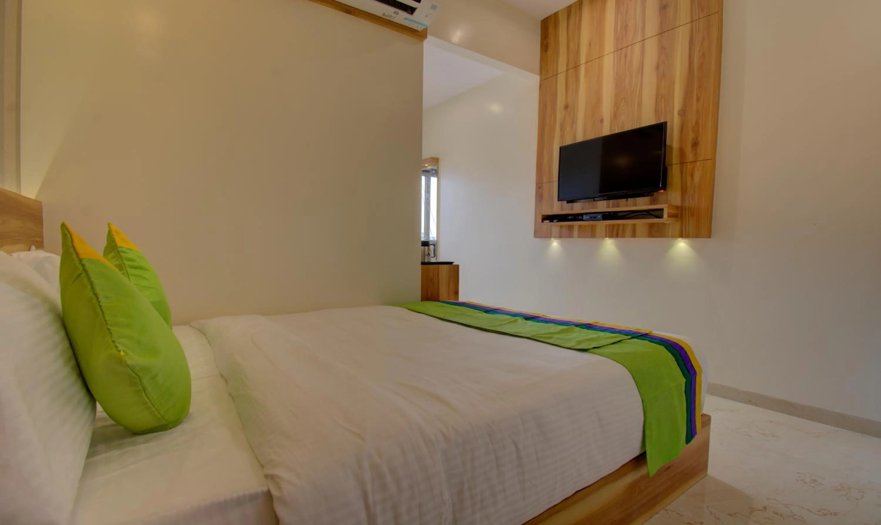 Bed in Hotel Amisha International