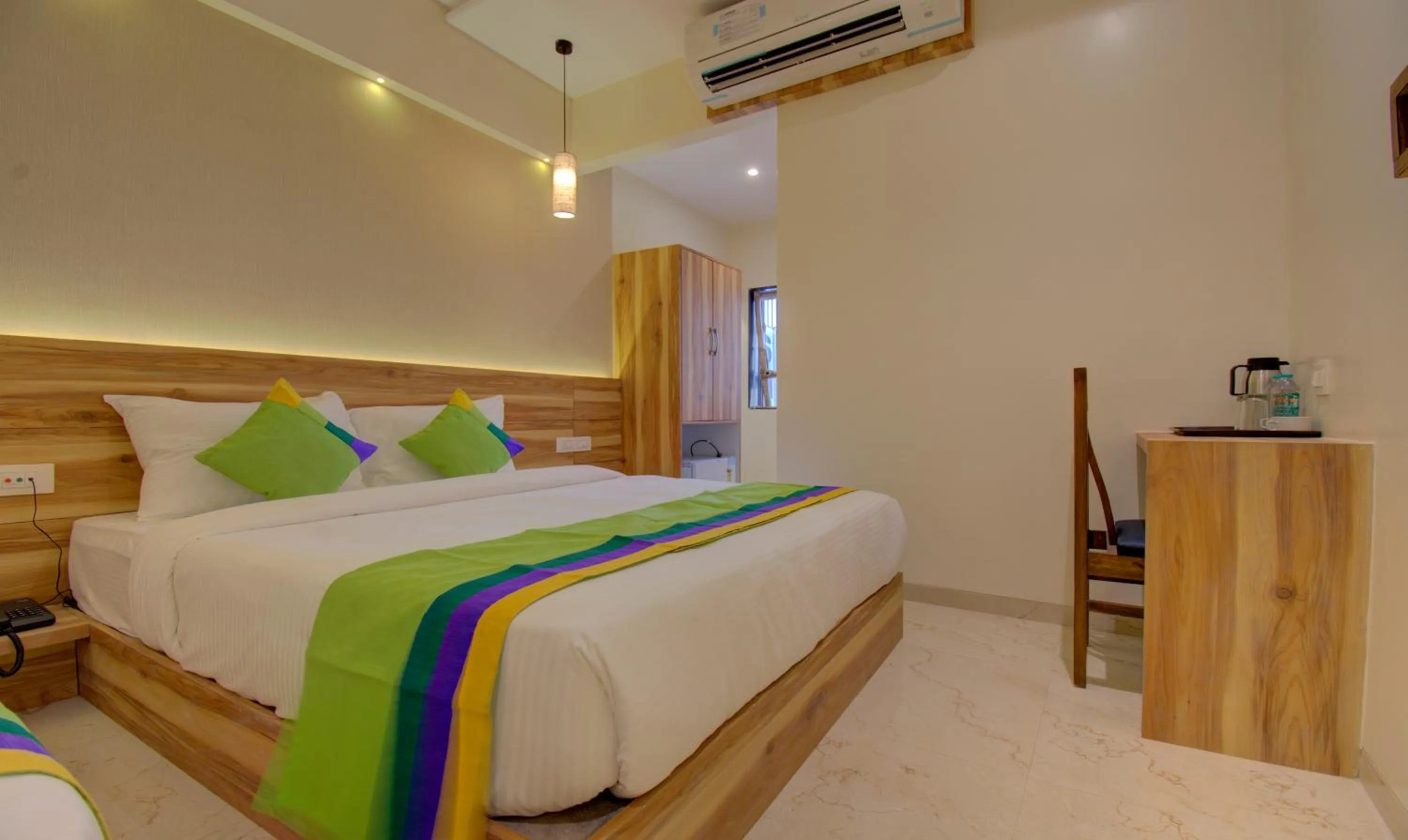 Bed in Hotel Amisha International