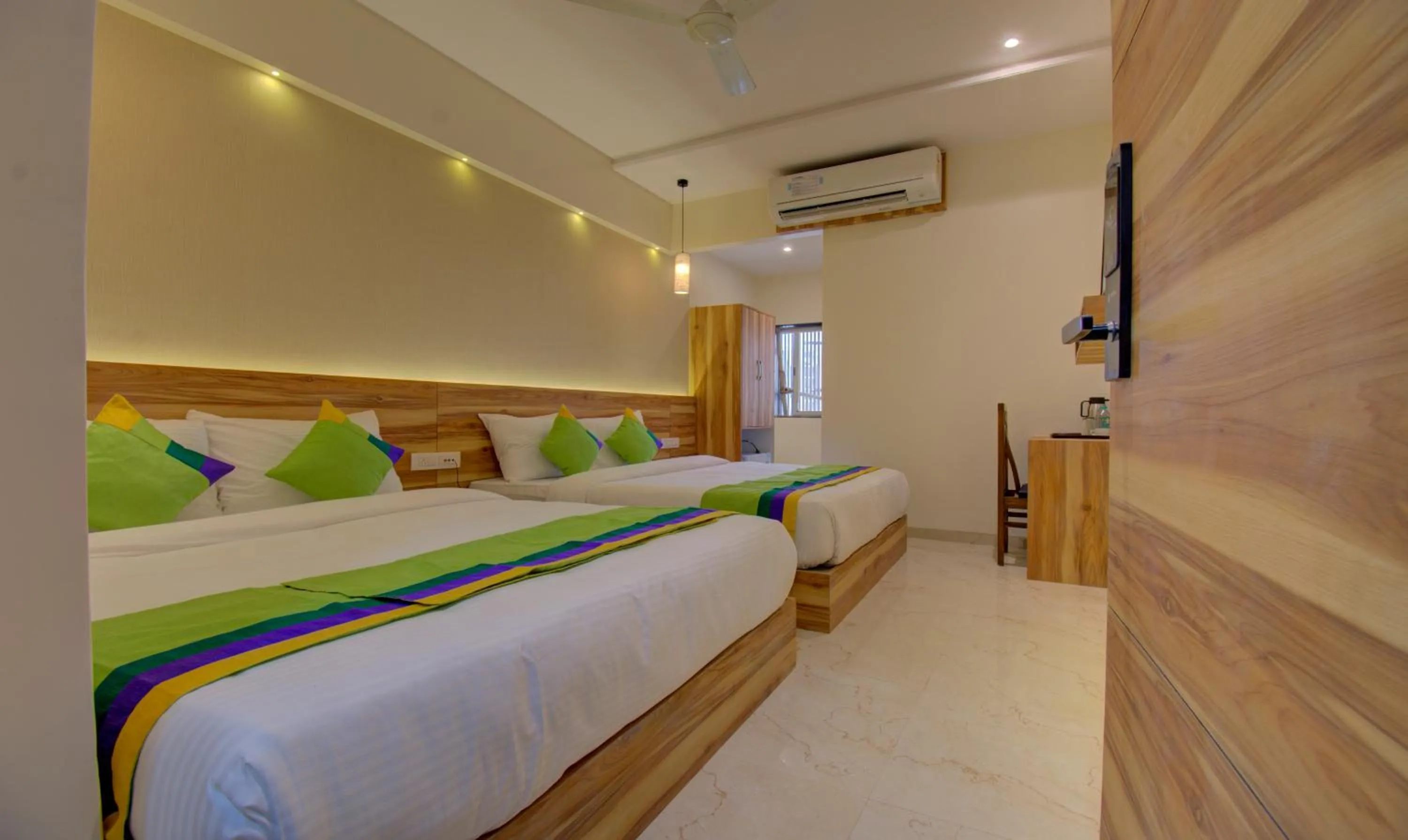 Bed in Hotel Amisha International