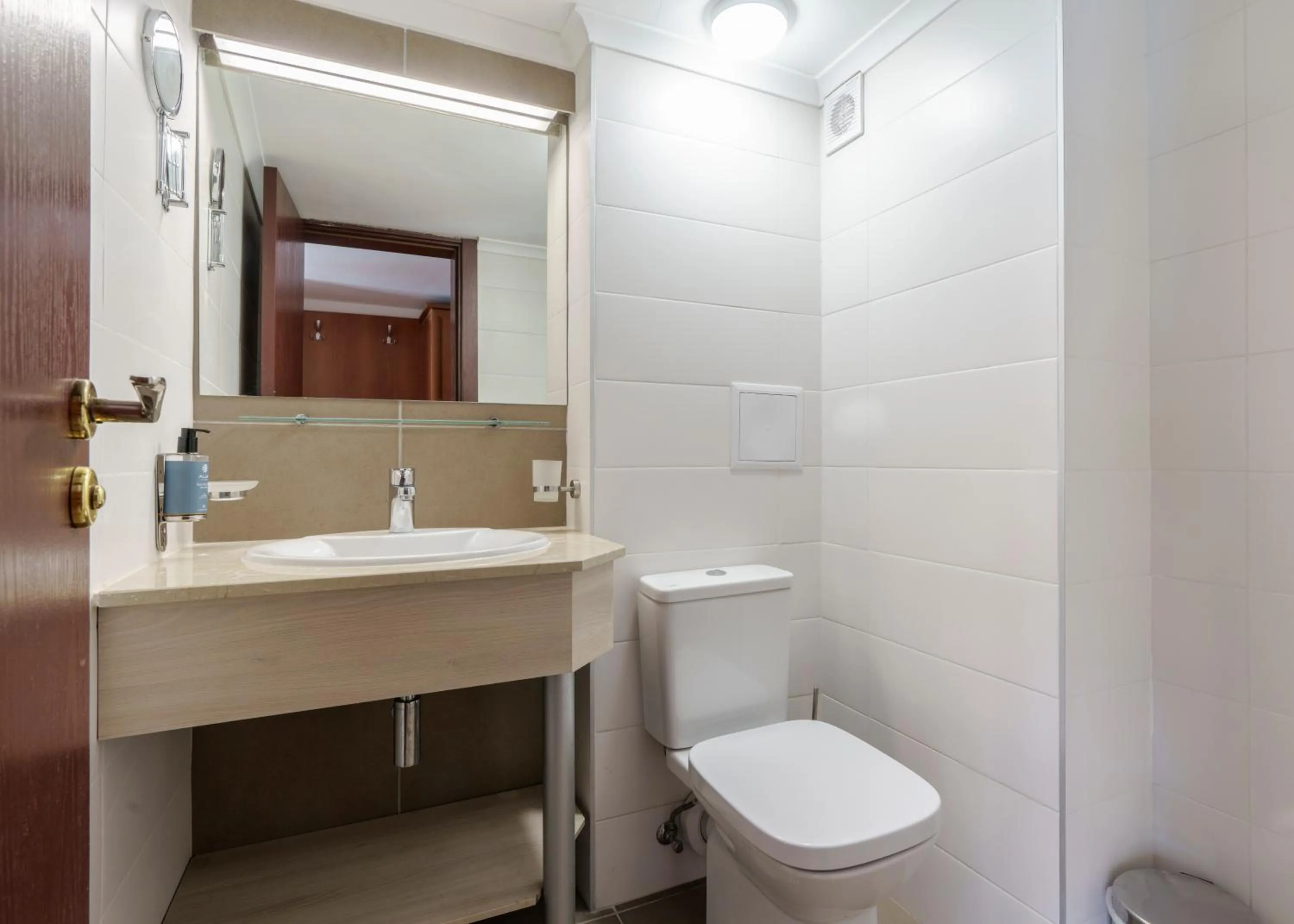 Bathroom in AluaSun Helios Beach - All Inclusive