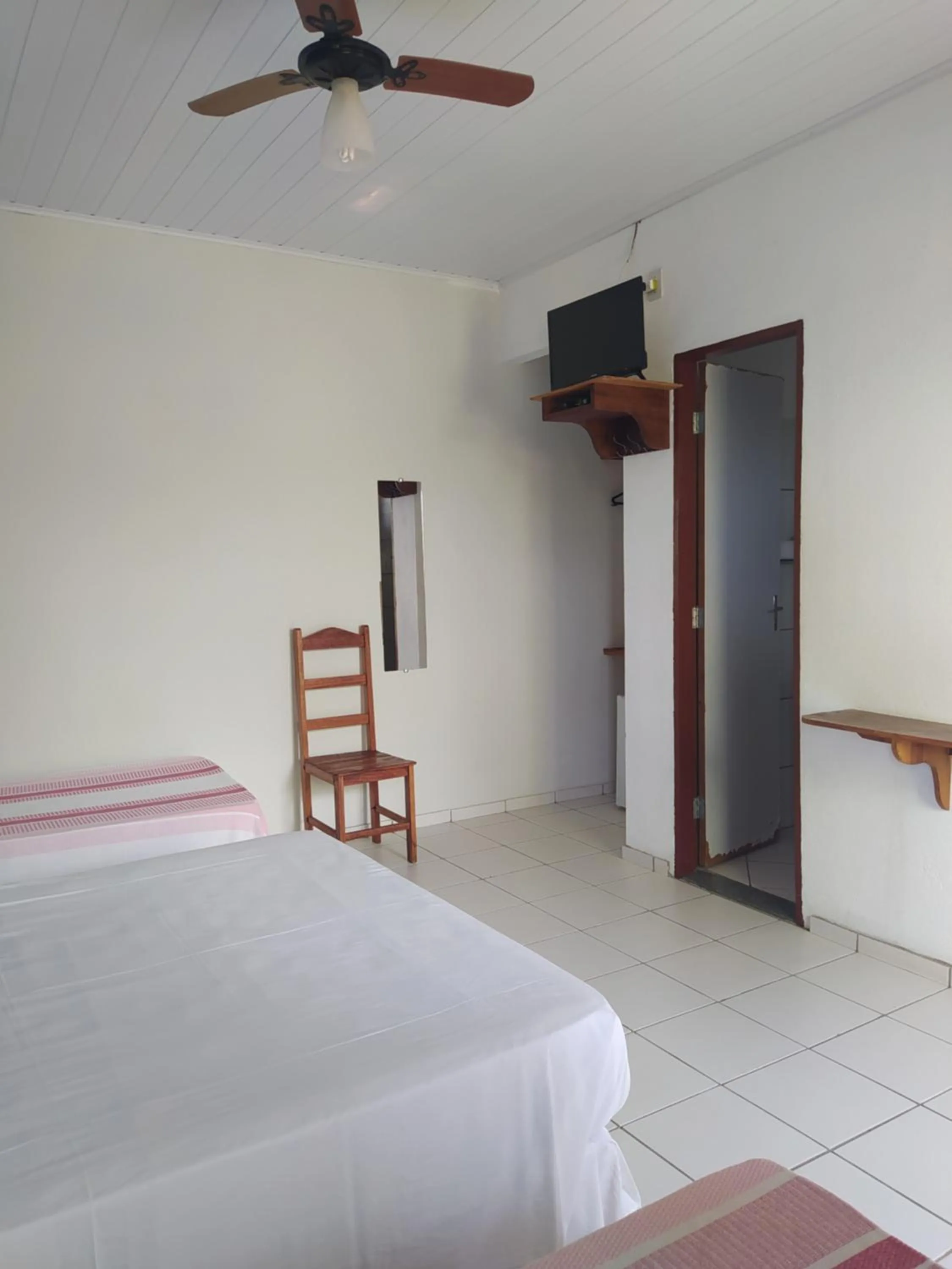 Bed in Pousada Água de Côco