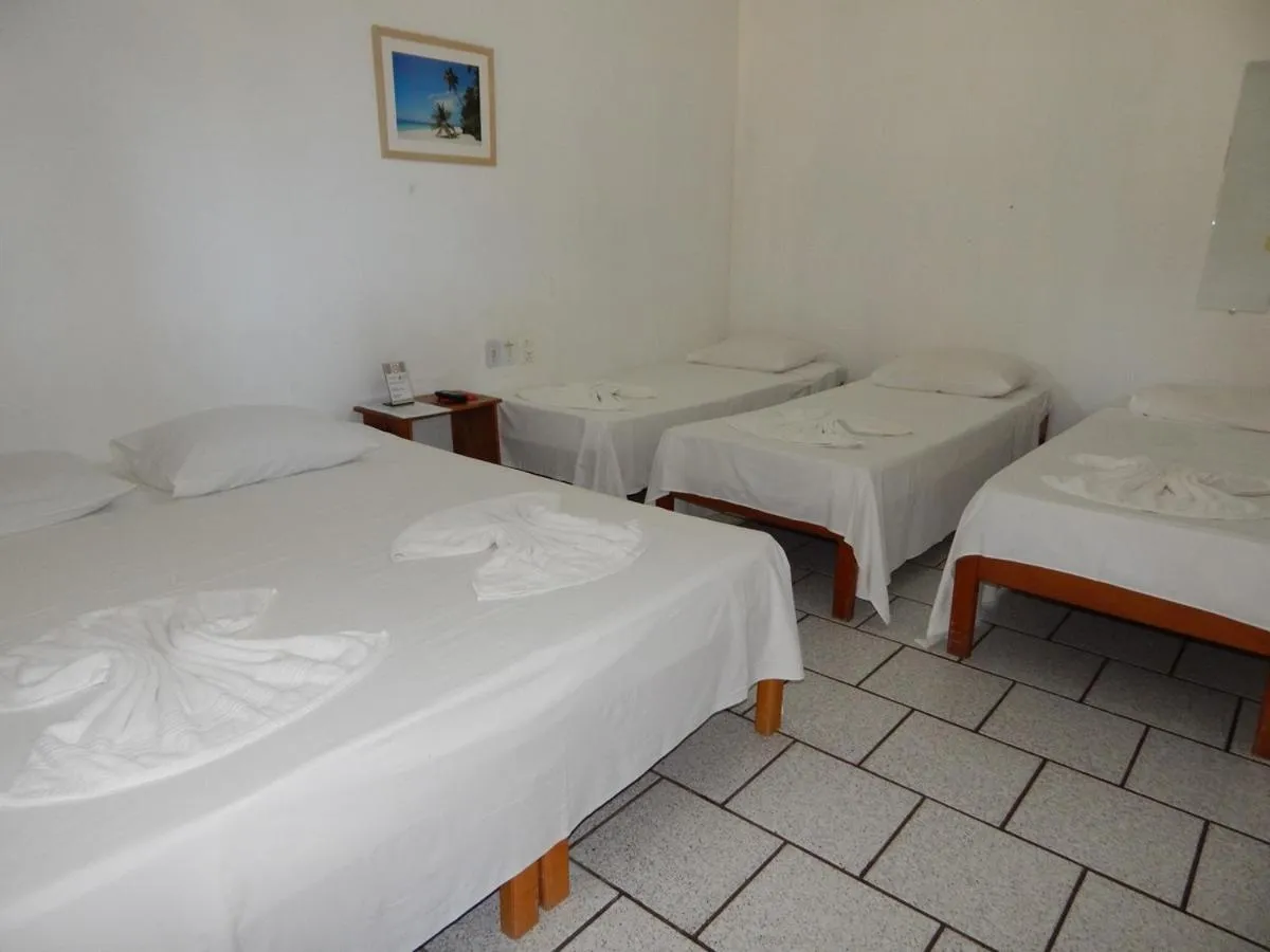 Bed in Pousada Água de Côco