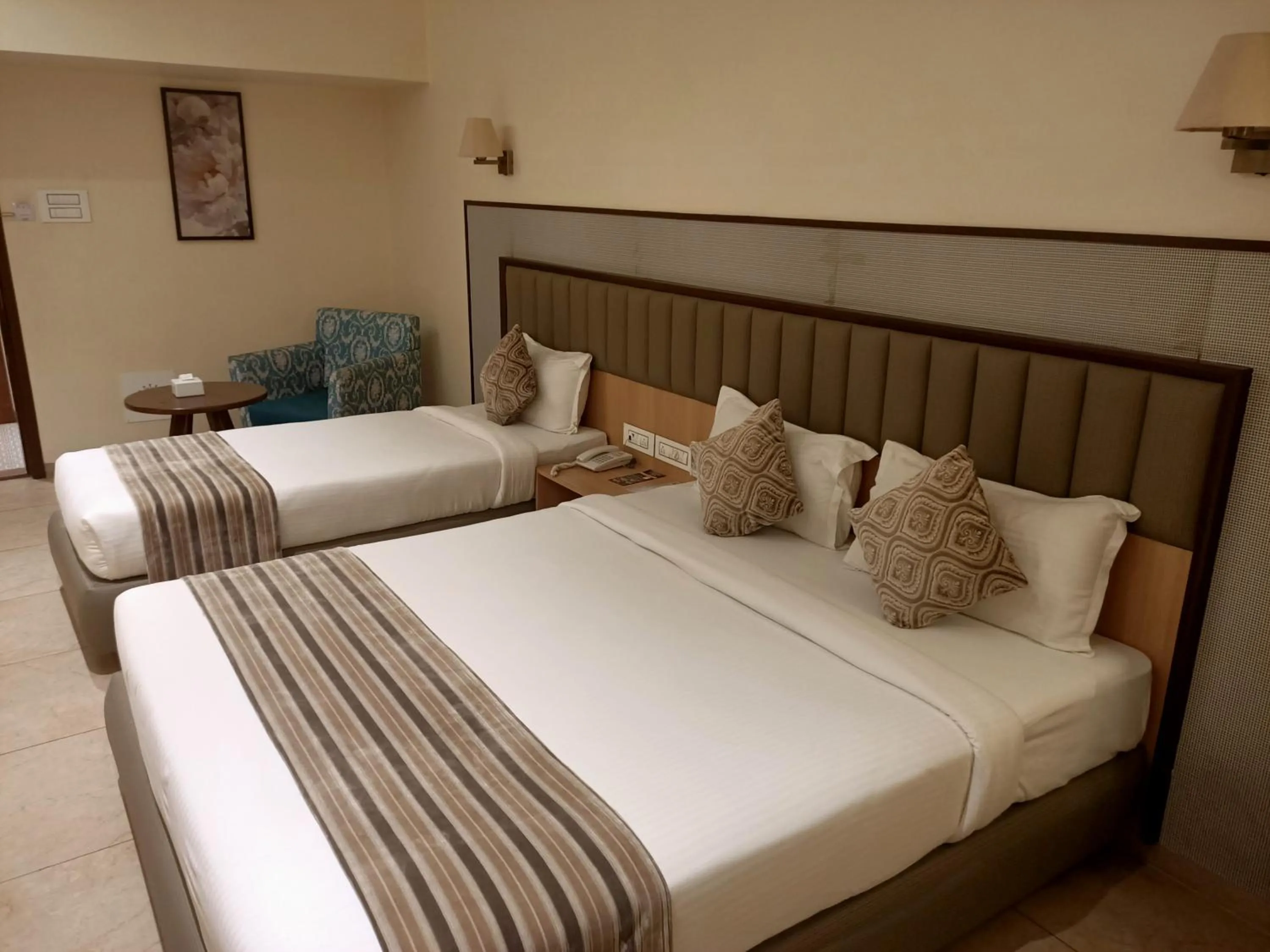 Bed in Rudra Shelter Business Hotel