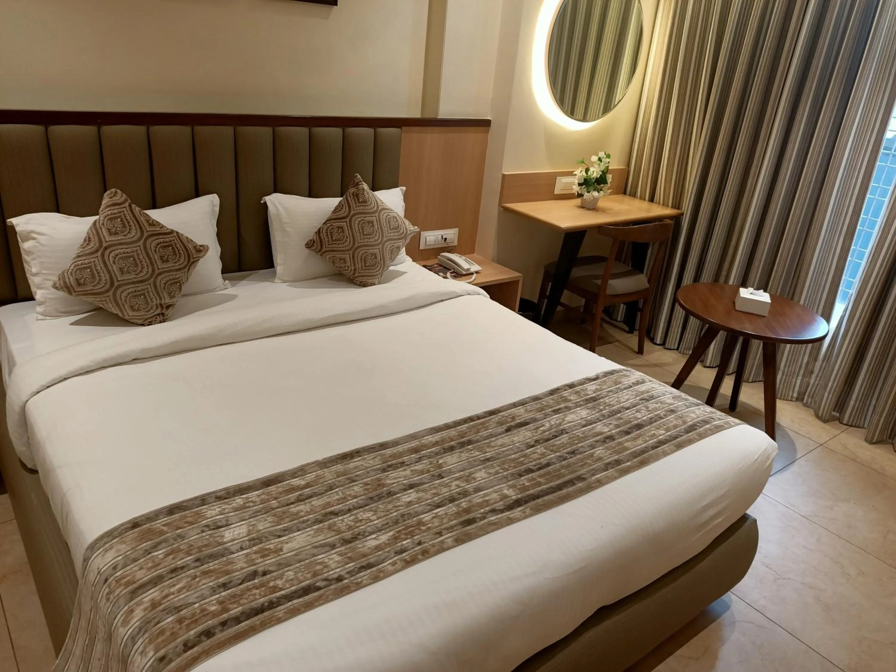 Bed in Rudra Shelter Business Hotel