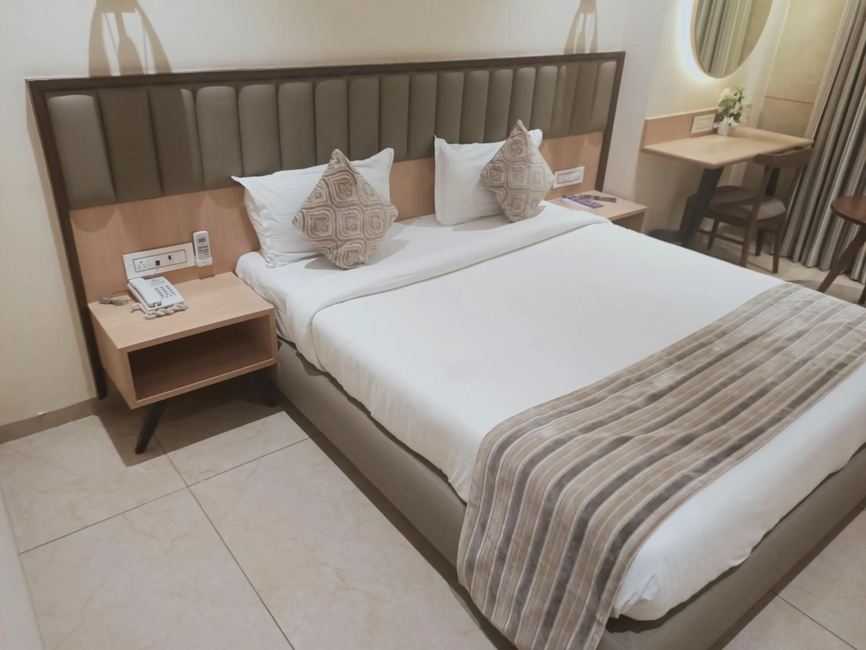 Bed in Rudra Shelter Business Hotel