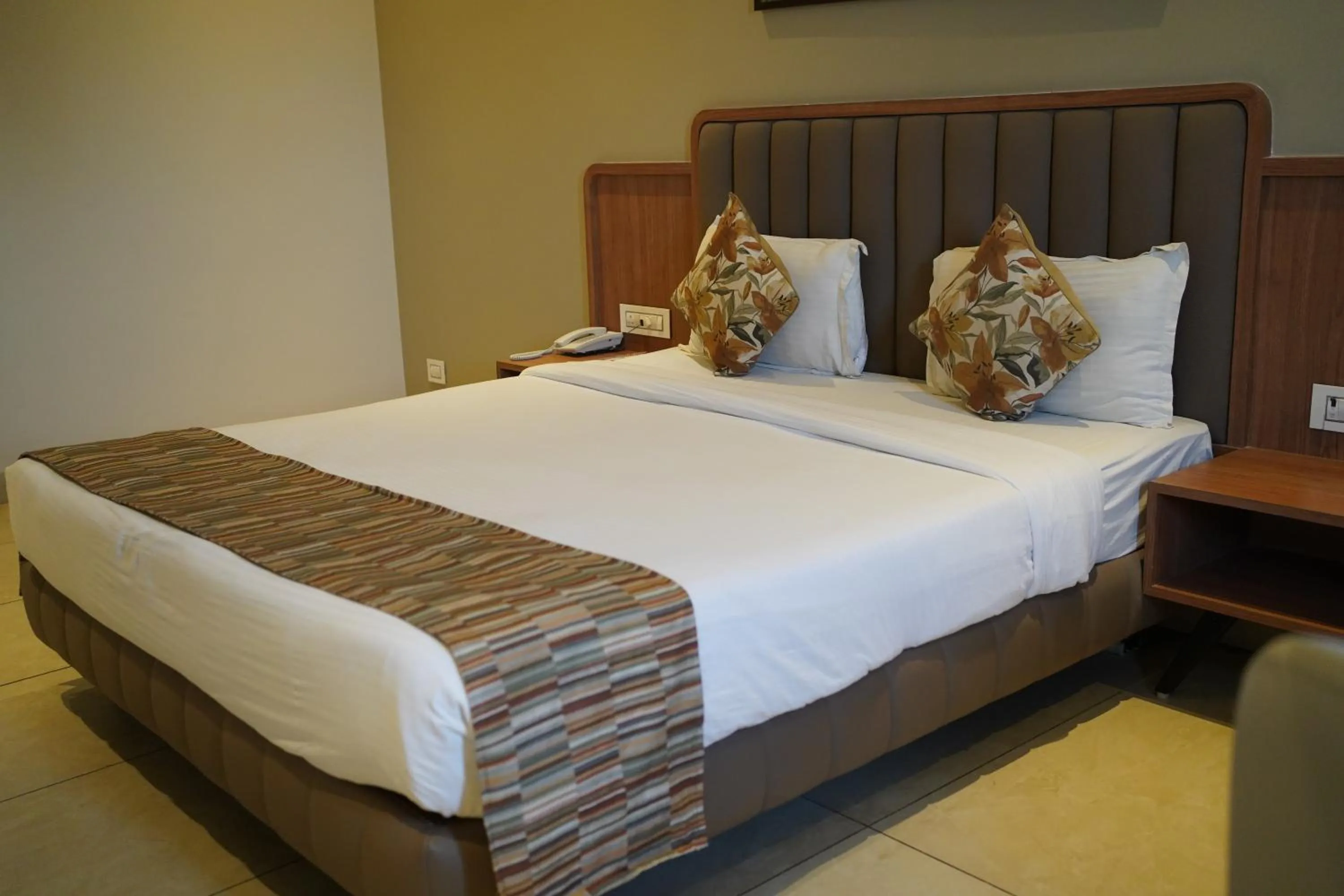 Bed in Rudra Shelter Business Hotel