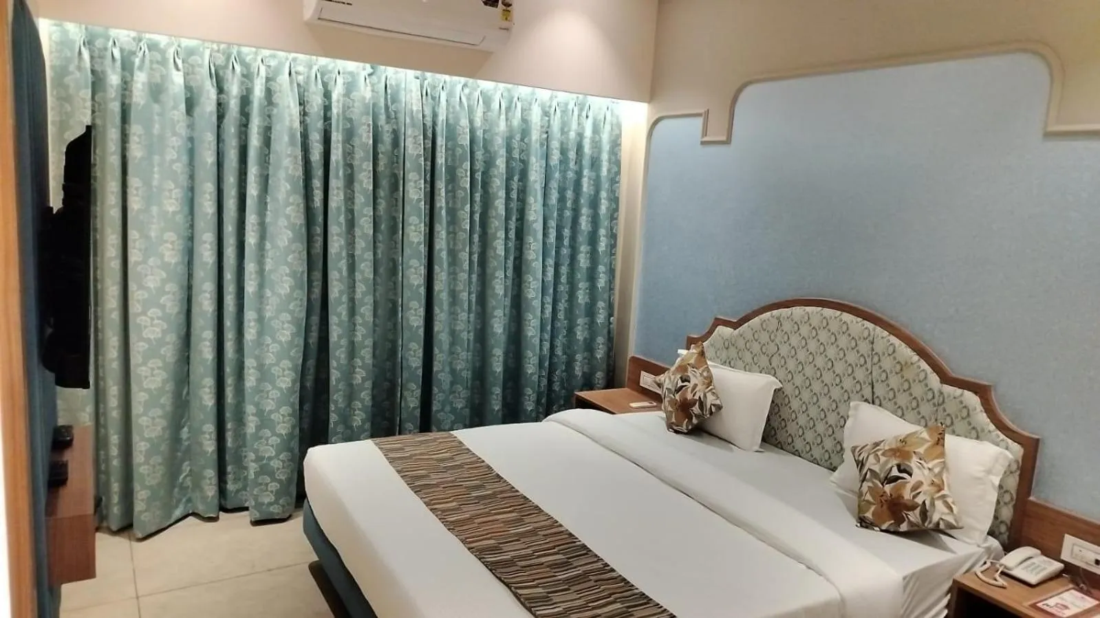 Photo of the whole room, Bed in Rudra Shelter Business Hotel