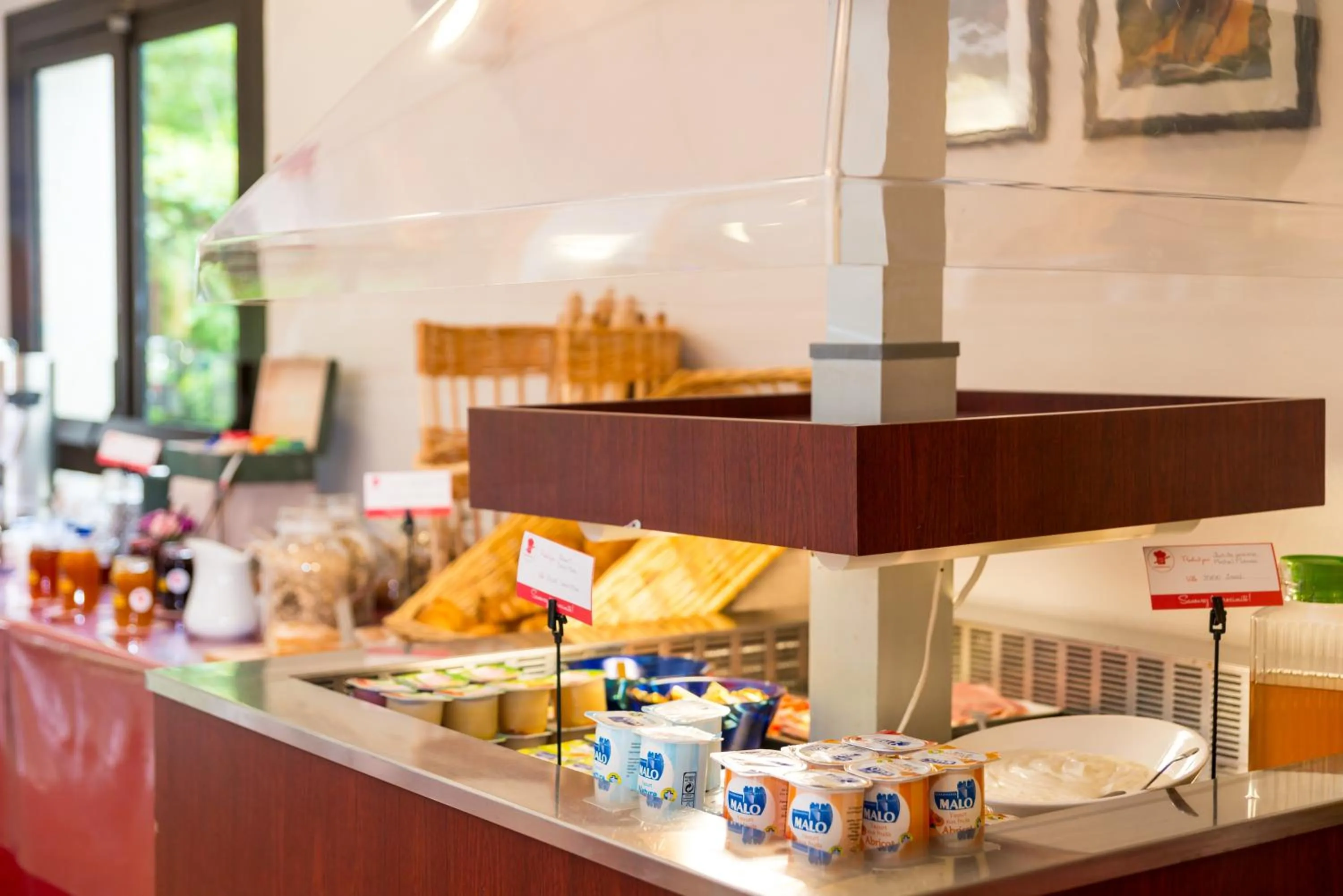 Buffet breakfast in Brit Hotel Rennes Cesson