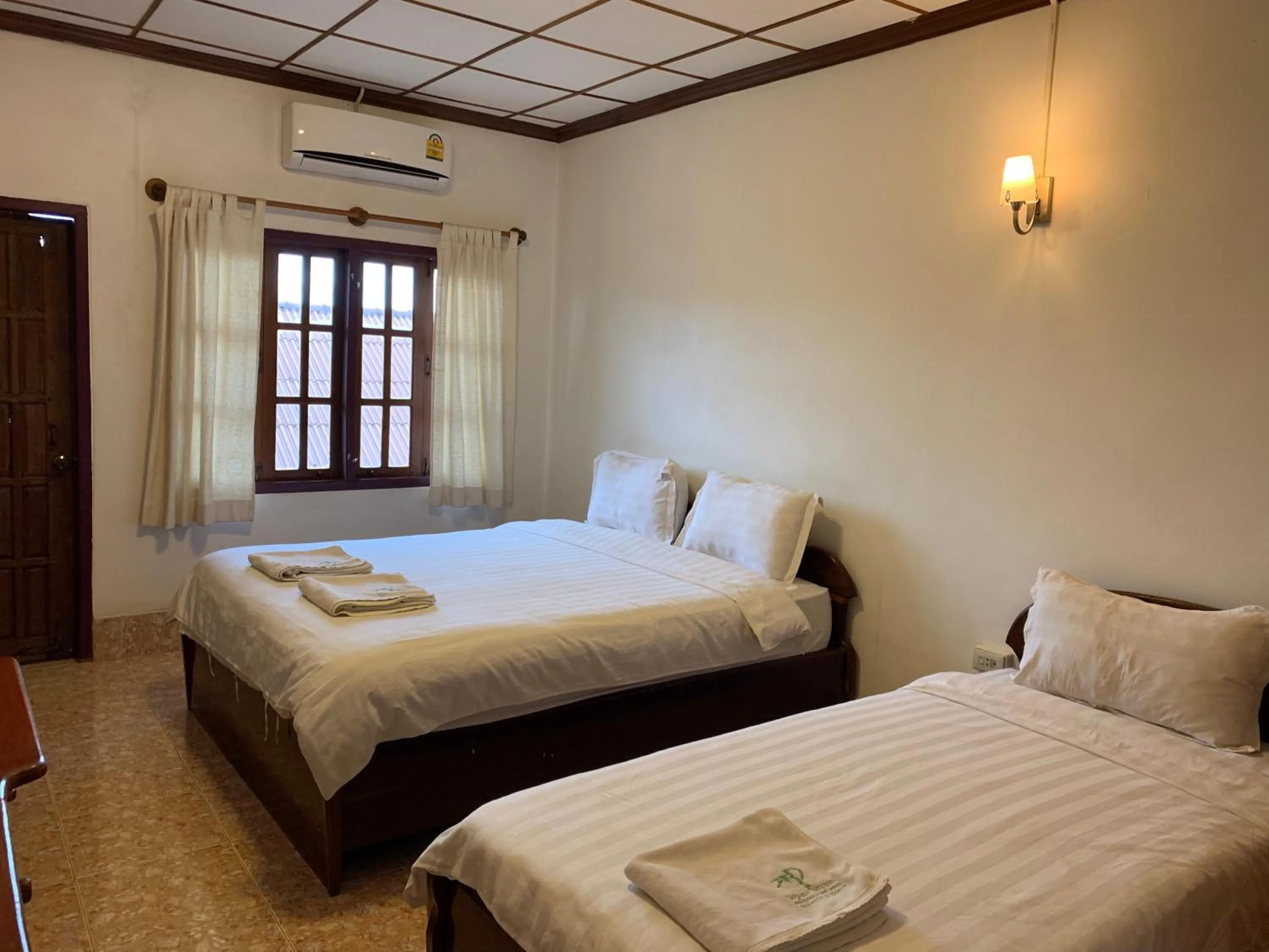 Bed in Phaythavone Hotel