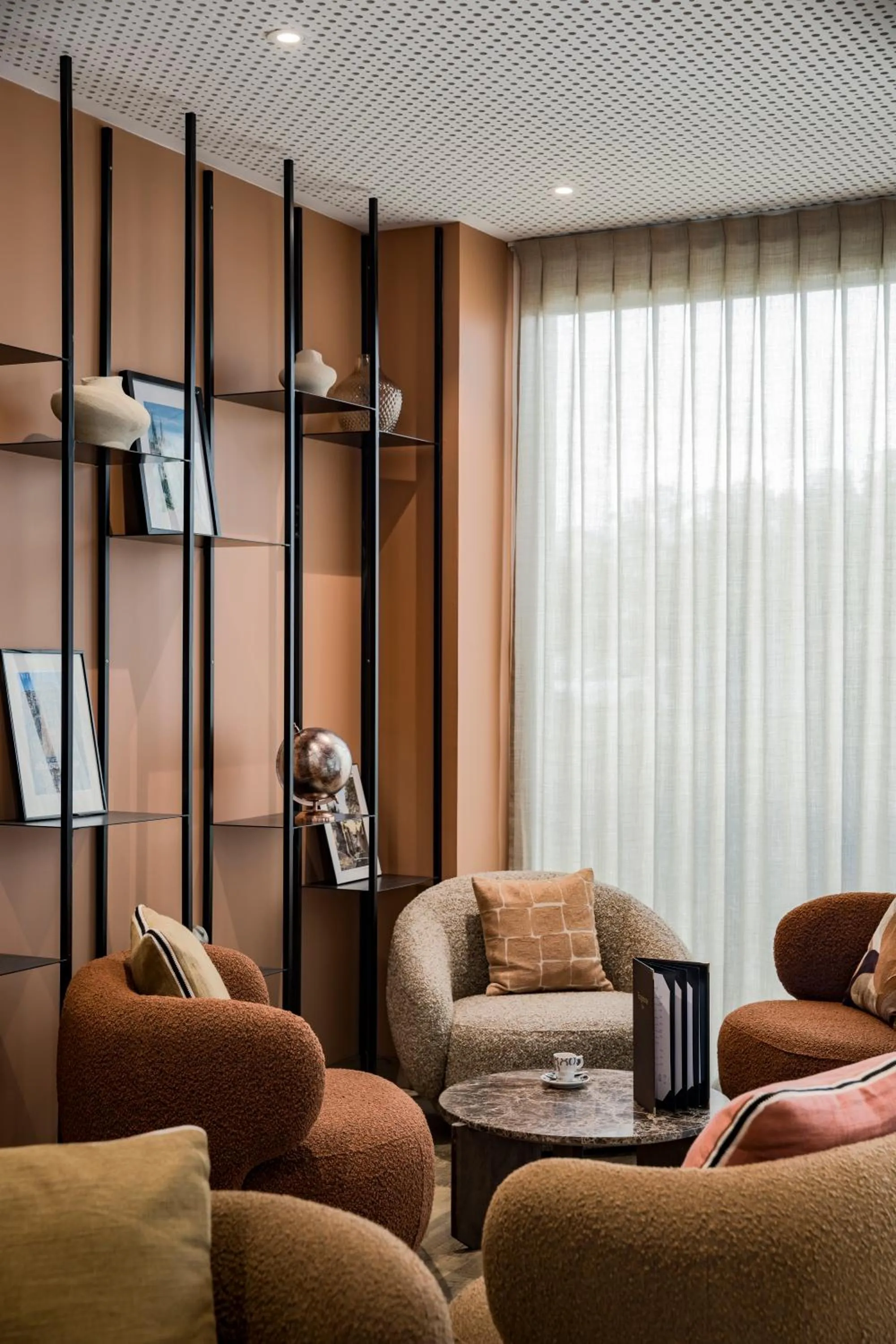 Communal lounge/ TV room in Mercure Chartres Est