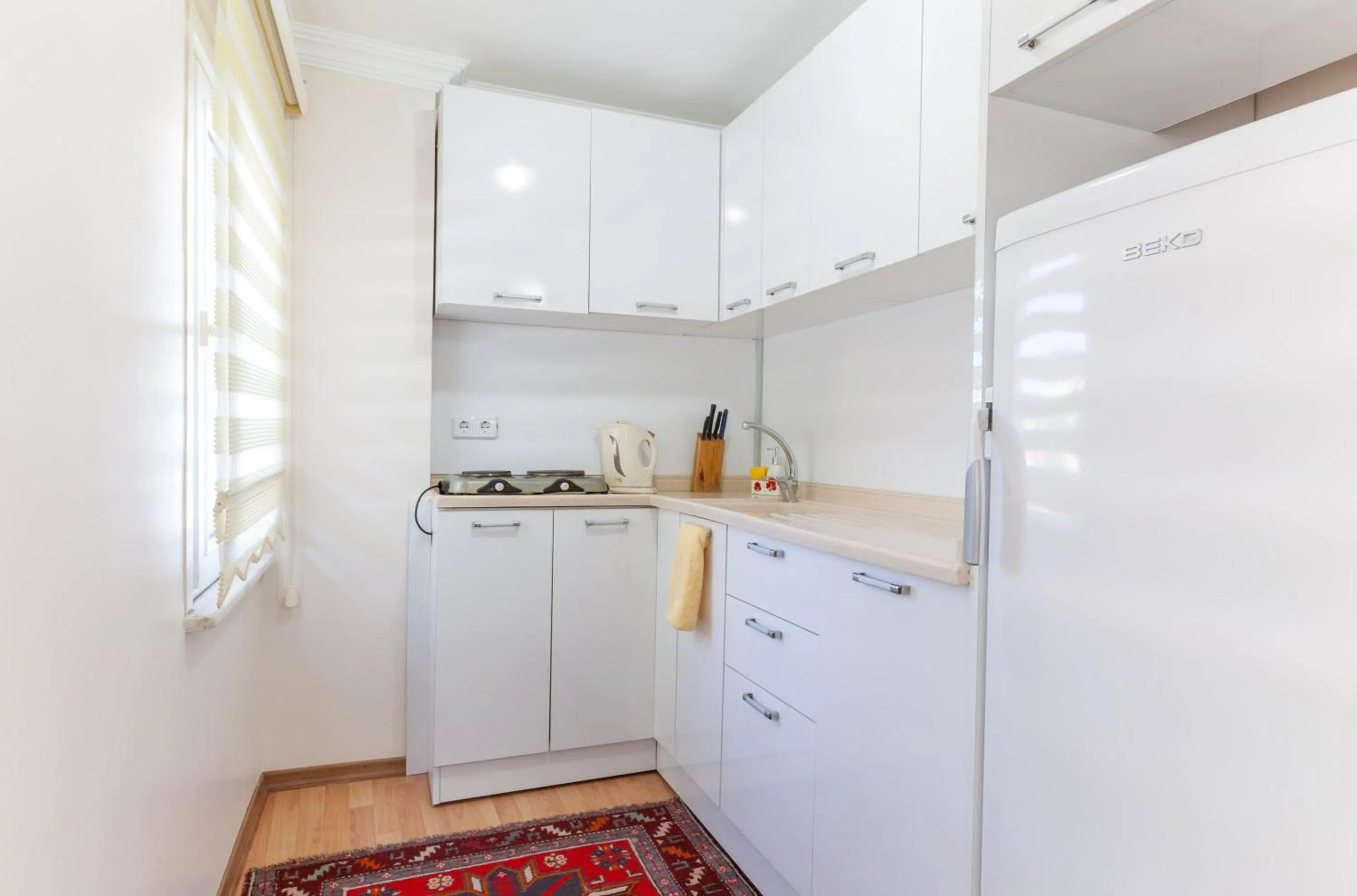 Kitchen or kitchenette in Sultan Apartments