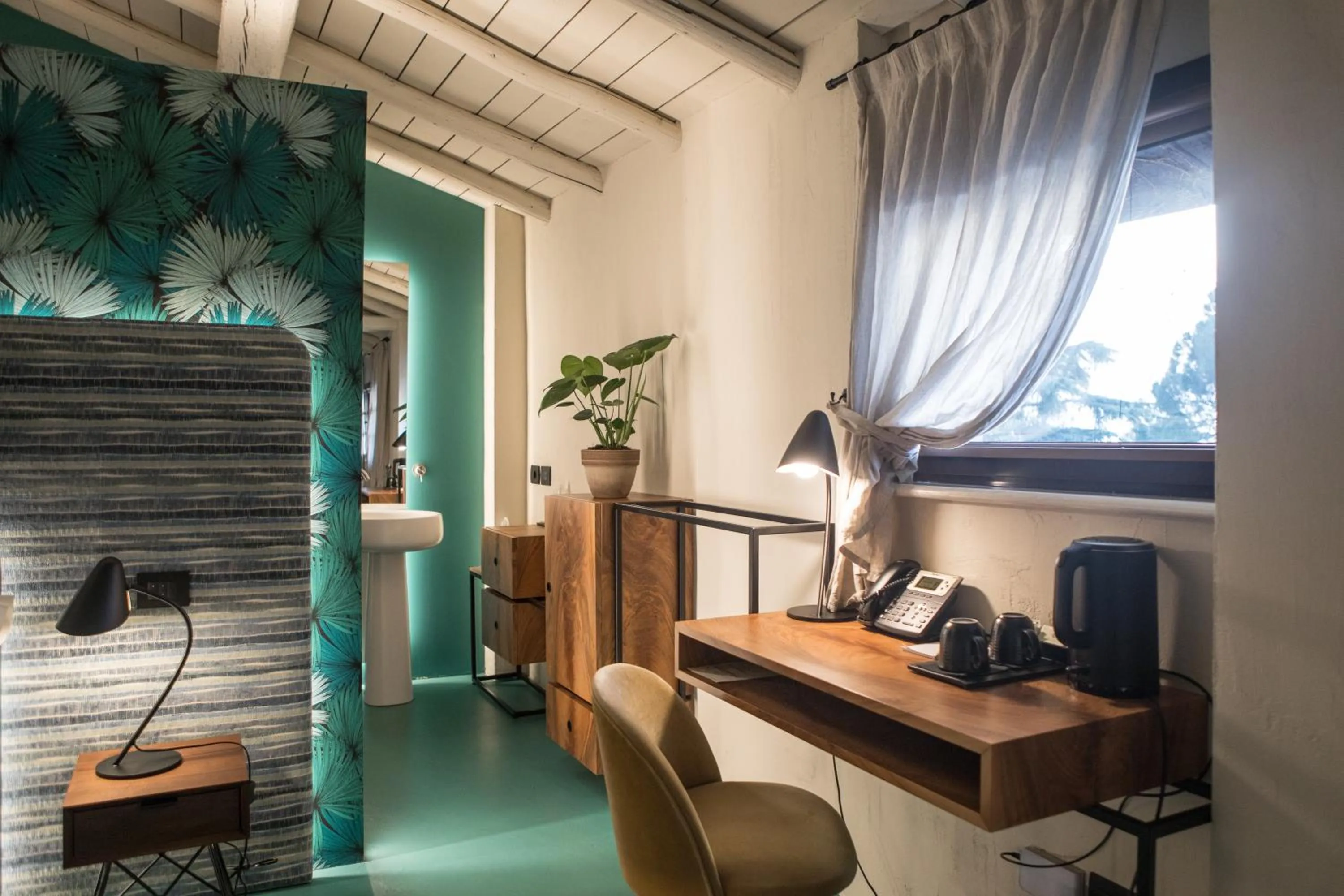 Seating area in Cà Toresele Relais Osteria Garden