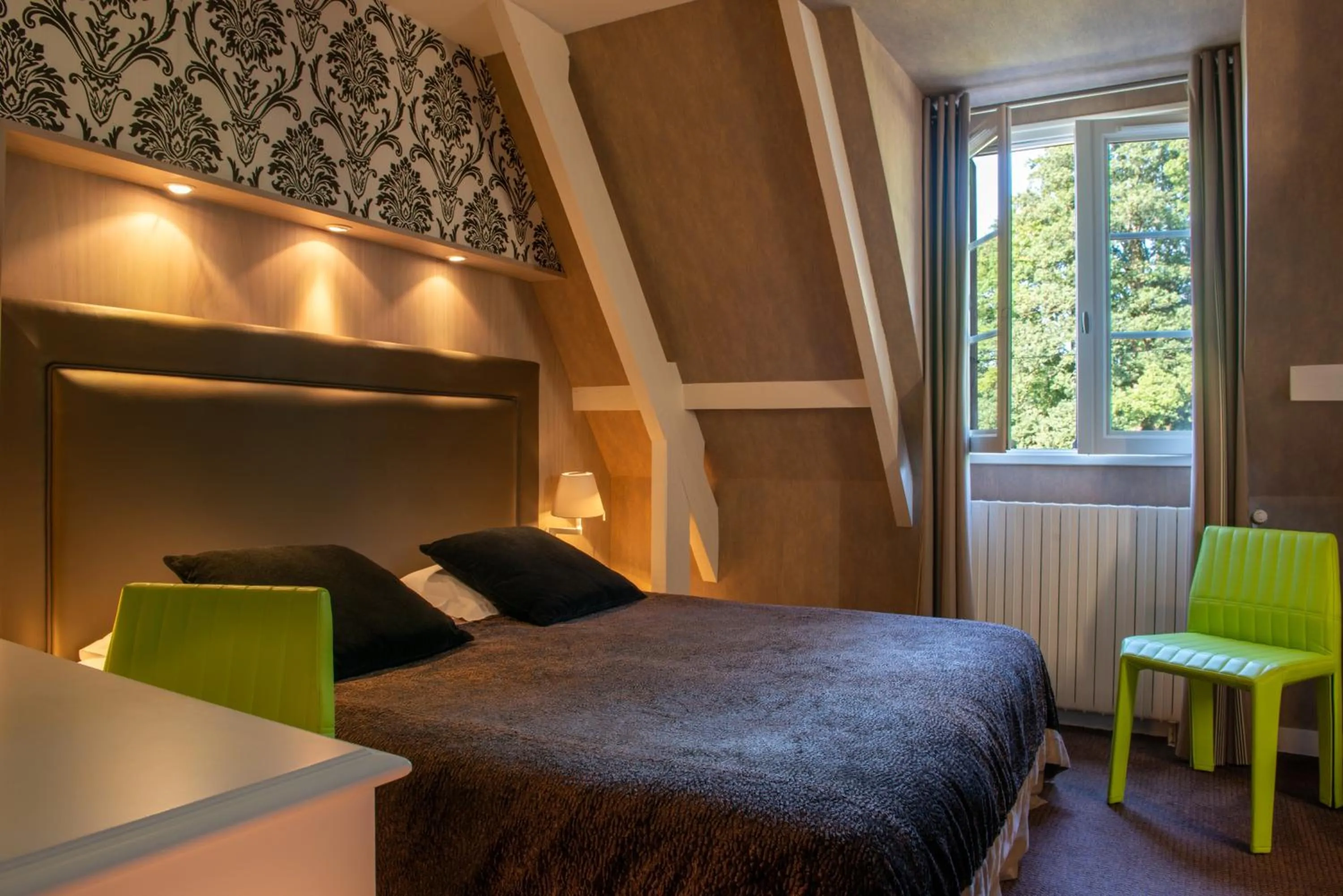 Bed in Le Manoir du Lys