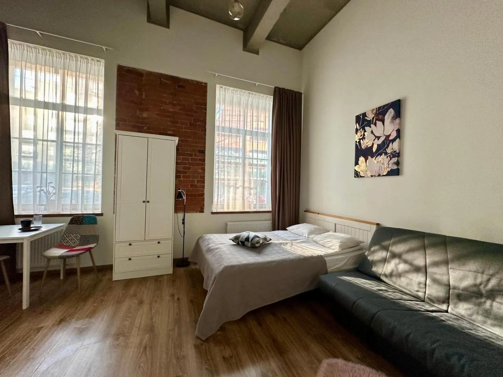 Bed in Filosoofi 1 Studio Apartments