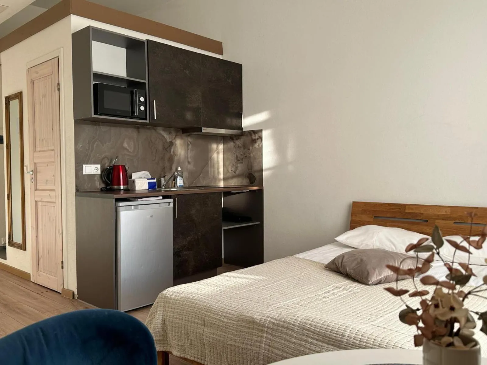 Bed in Filosoofi 1 Studio Apartments