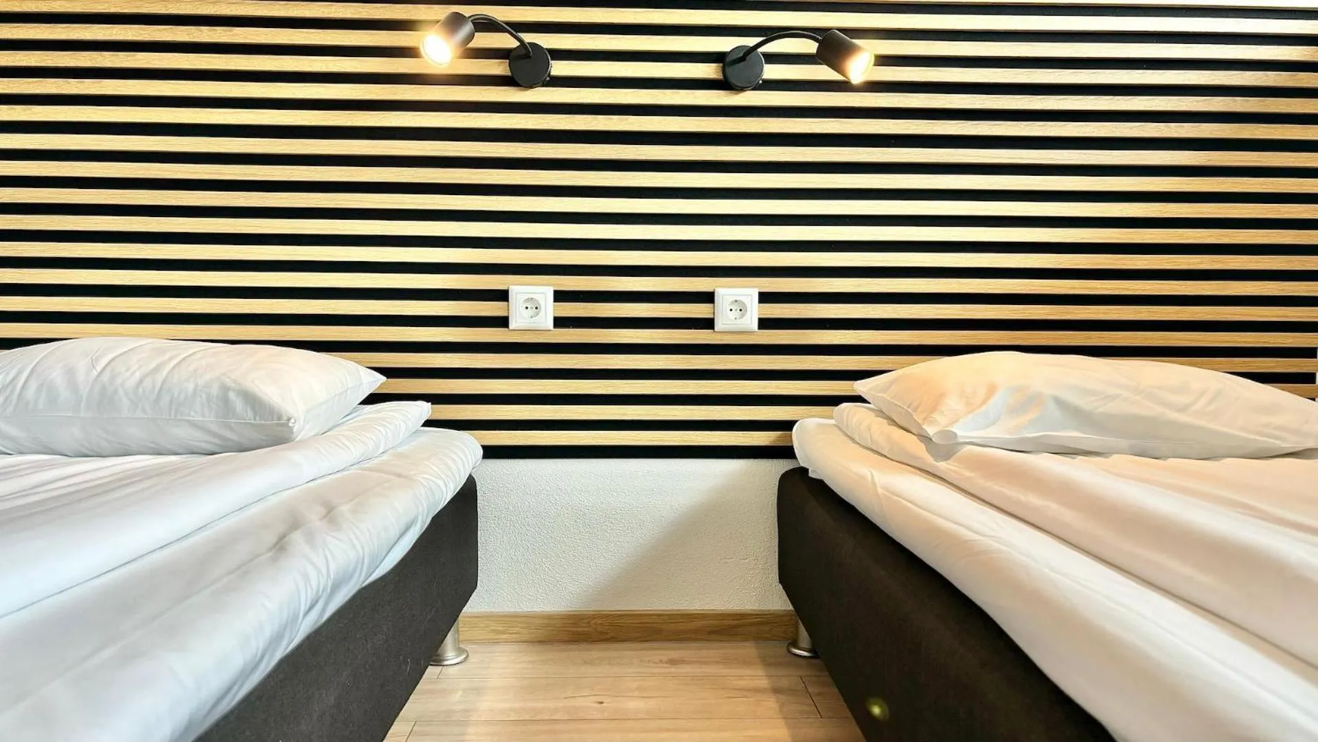 Bed in Filosoofi 1 Studio Apartments