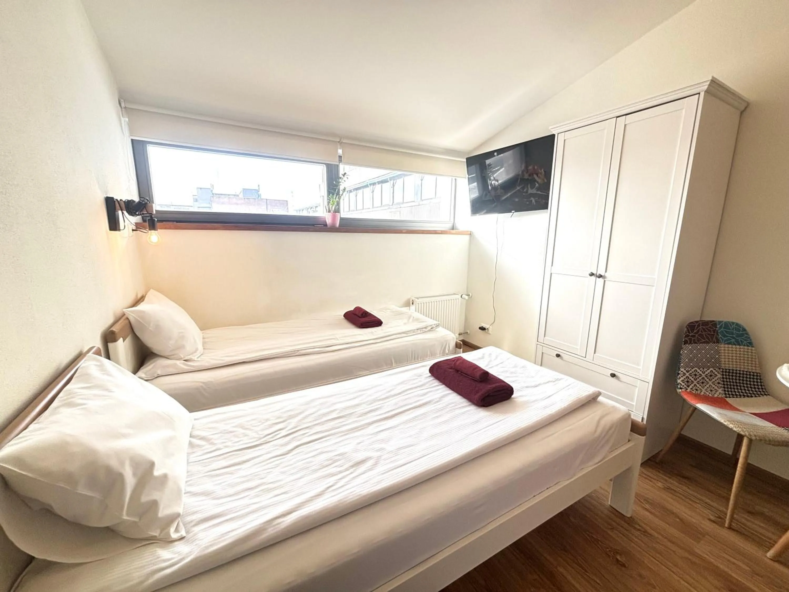 Bed in Filosoofi 1 Studio Apartments