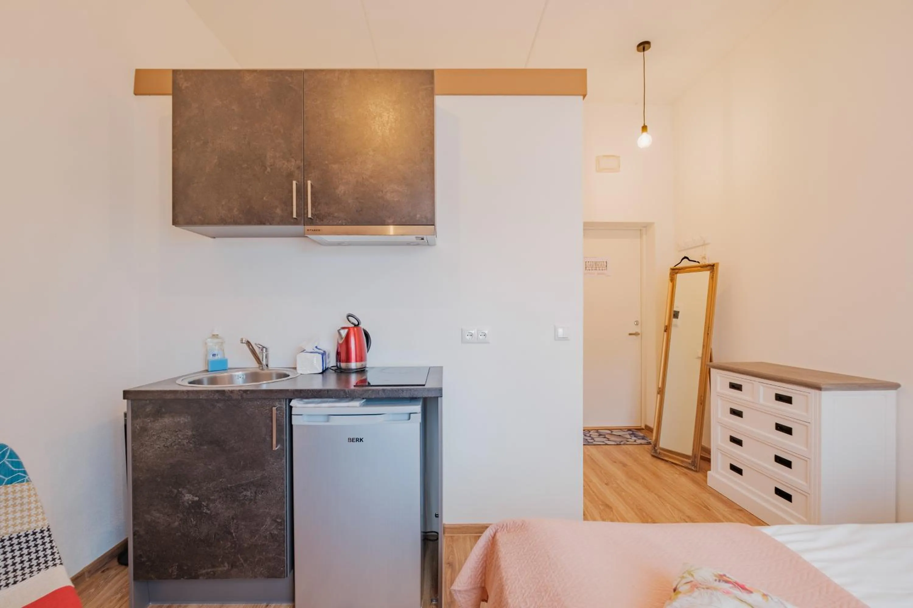 Kitchen or kitchenette, Bed in Filosoofi 1 Studio Apartments