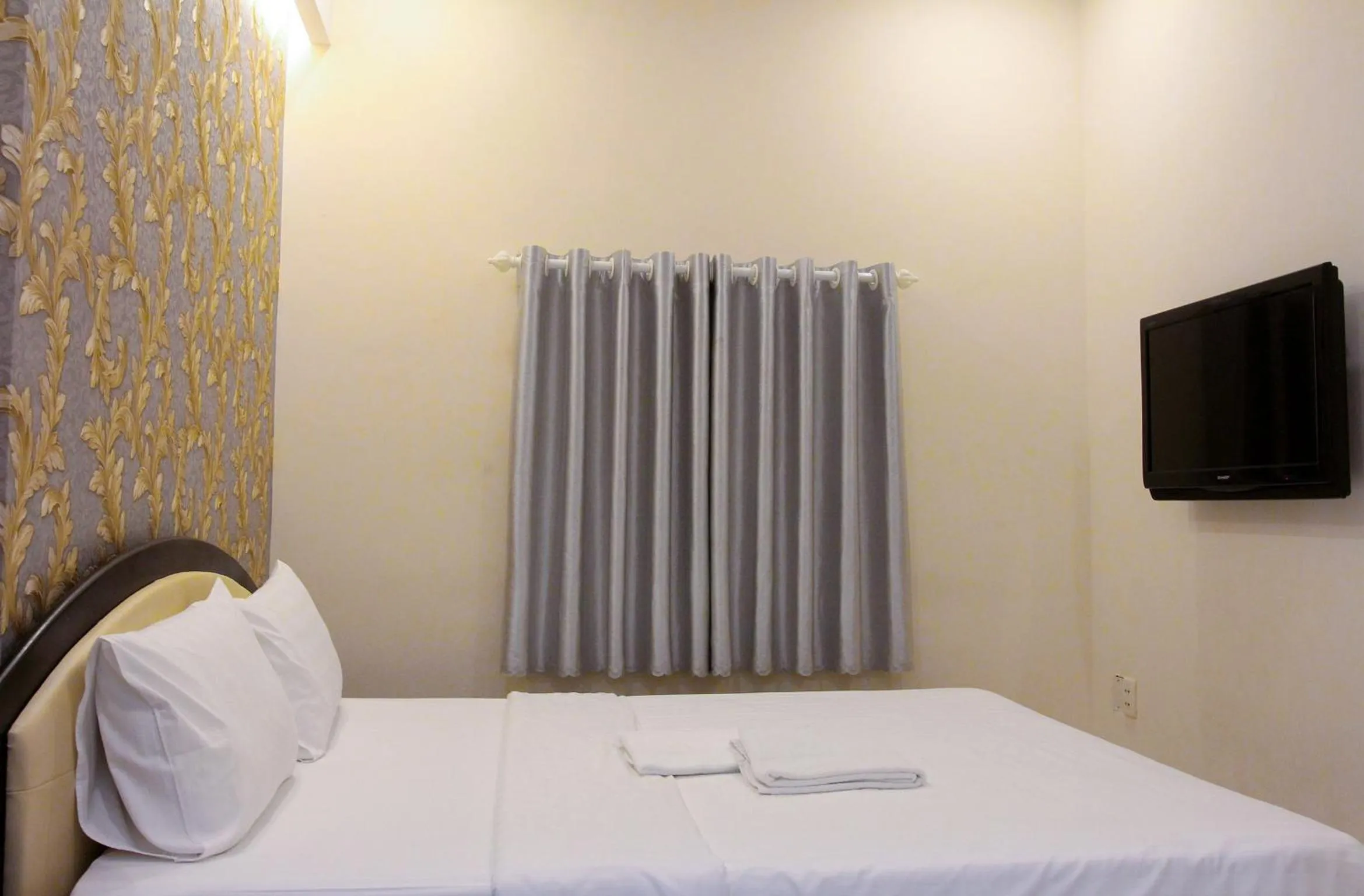 Bed in Violet Star Hotel and Spa