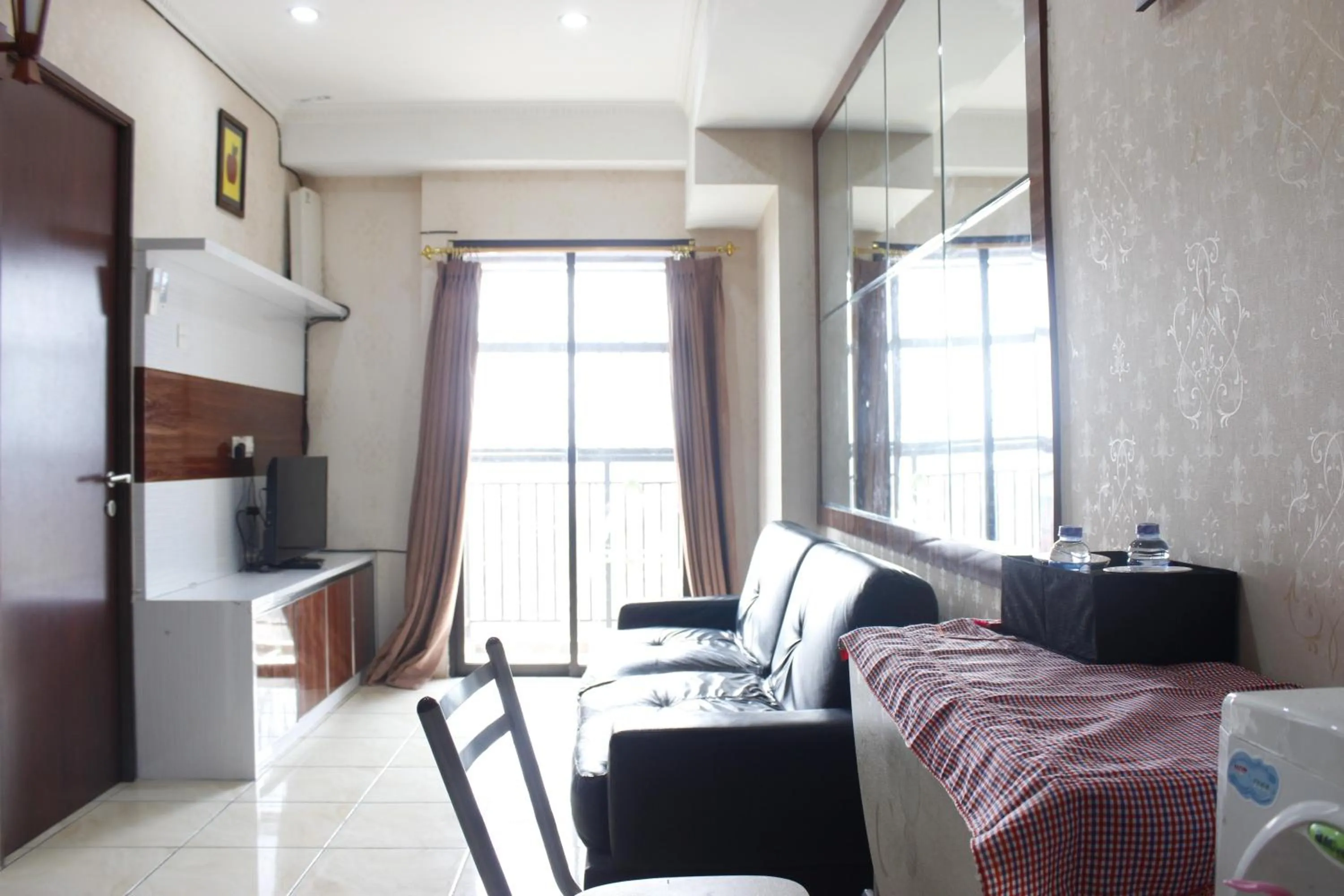 Cozy 2BR Tamansari Panoramic Apartment By Travelio