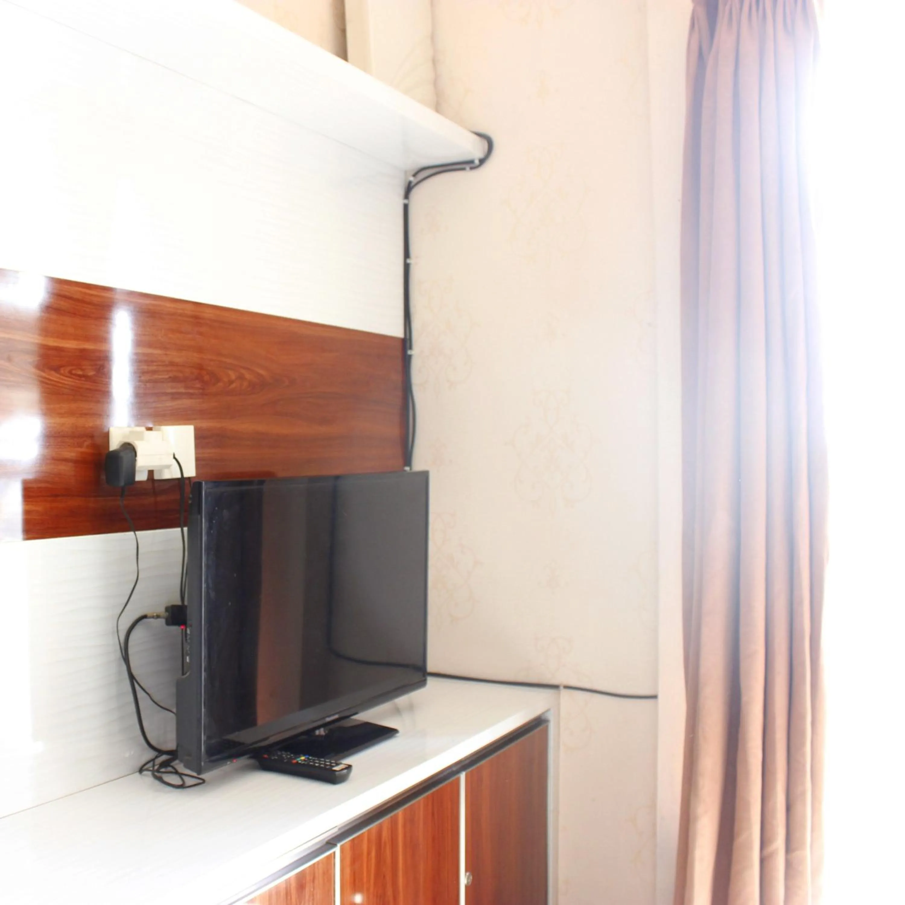 Cozy 2BR Tamansari Panoramic Apartment By Travelio