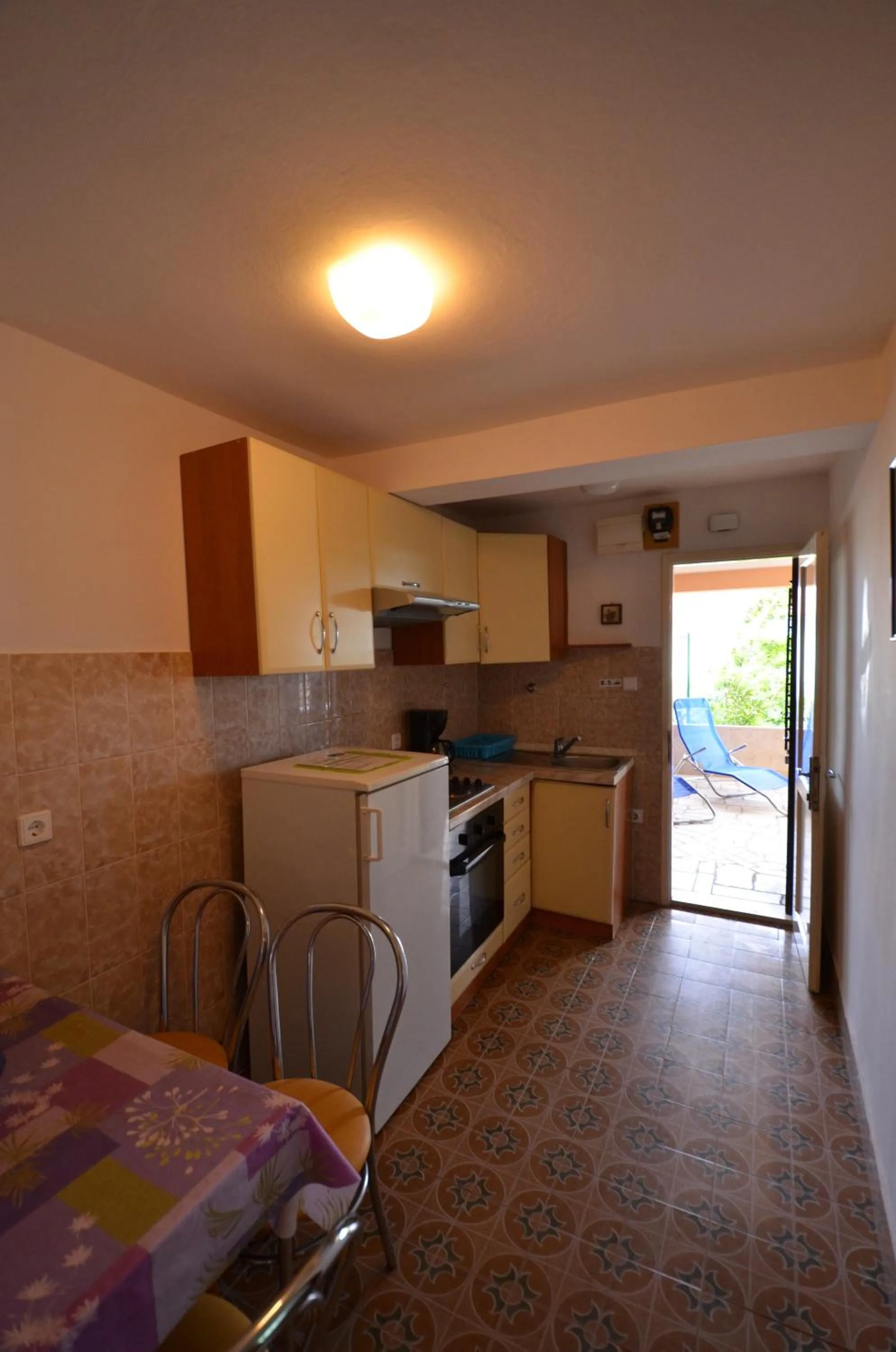 Kitchen or kitchenette in Apartments Villa Bartol