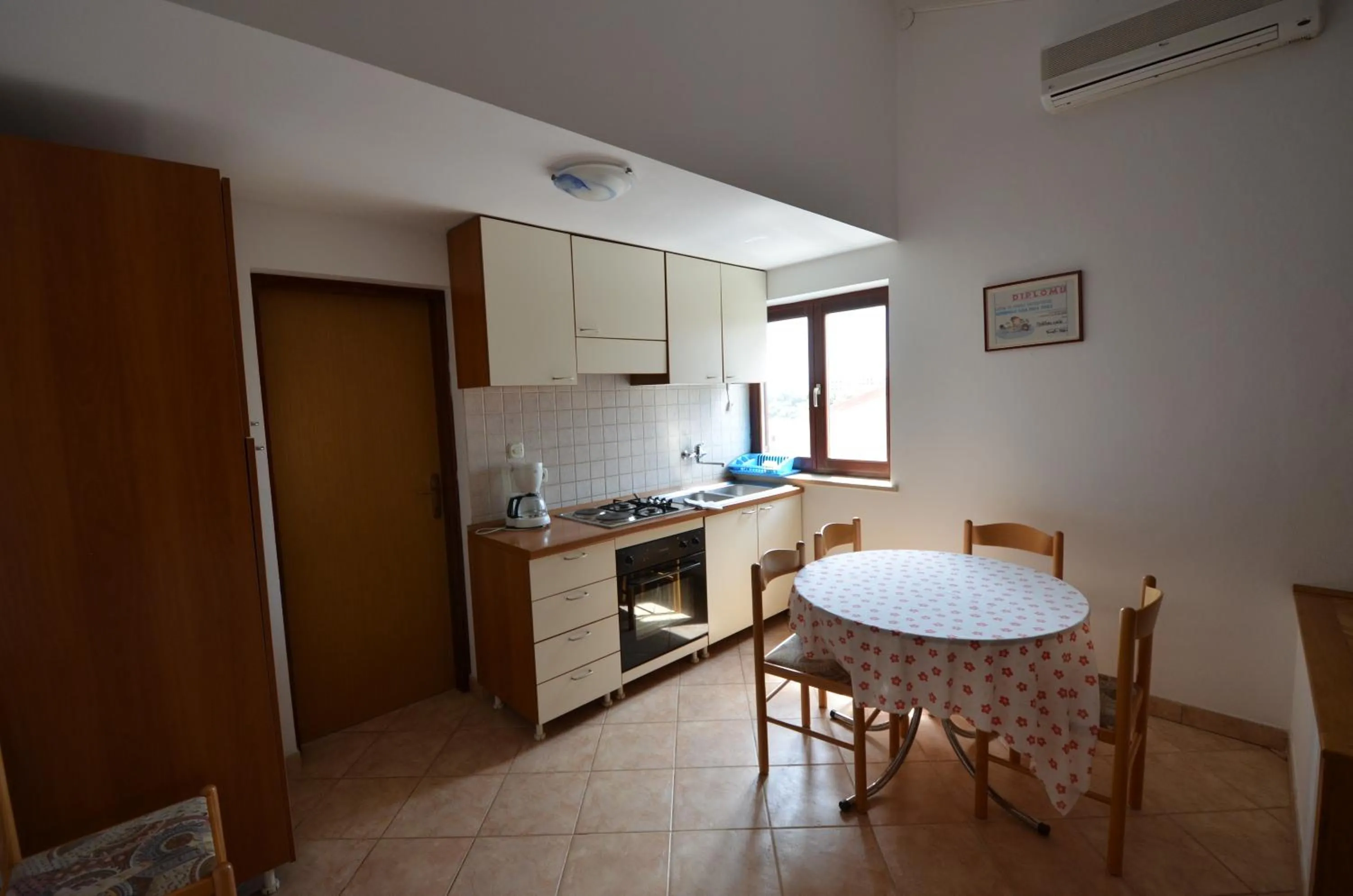 Kitchen or kitchenette in Apartments Villa Bartol
