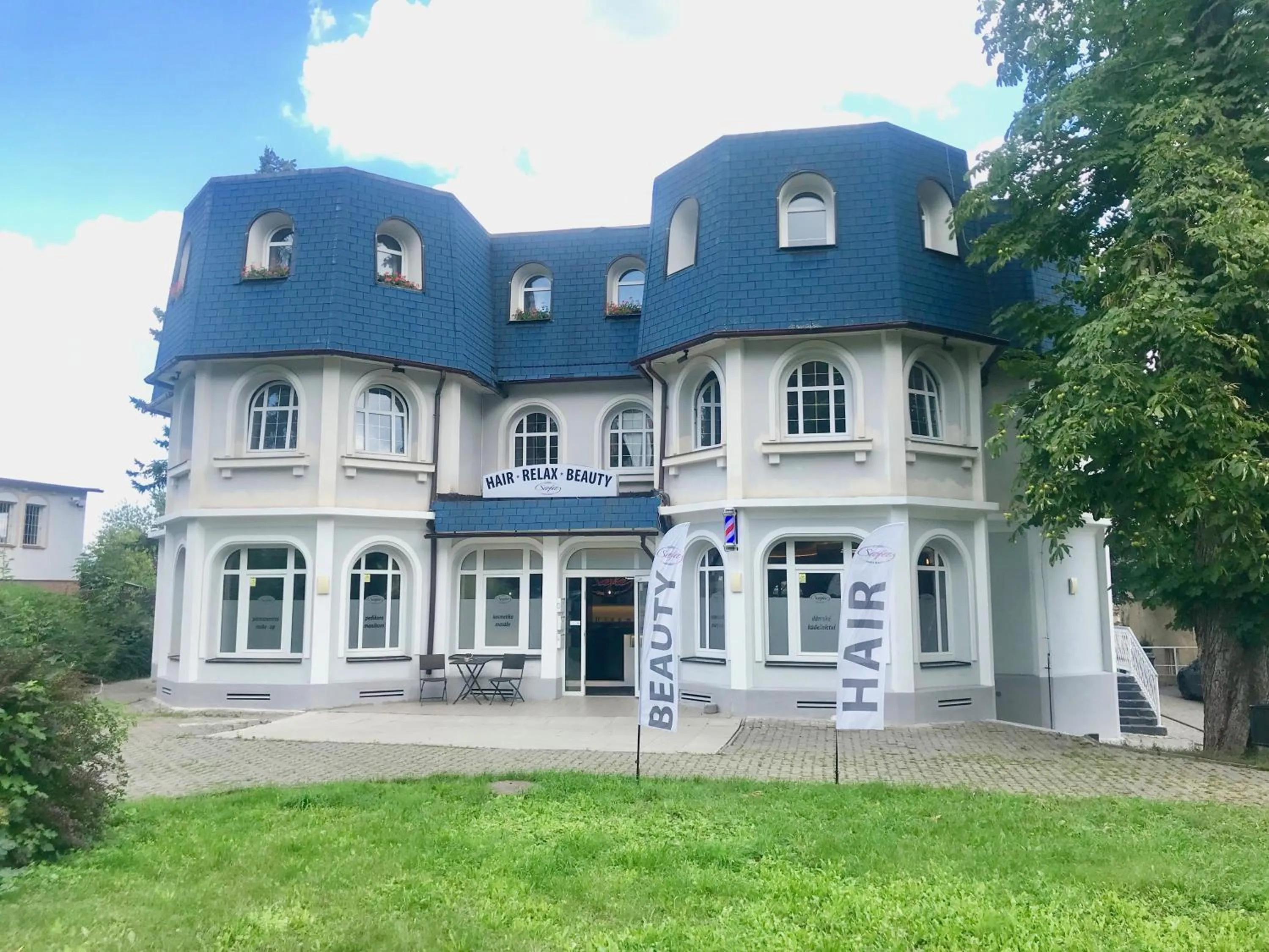 Property building in GrandLux Villa & Spa