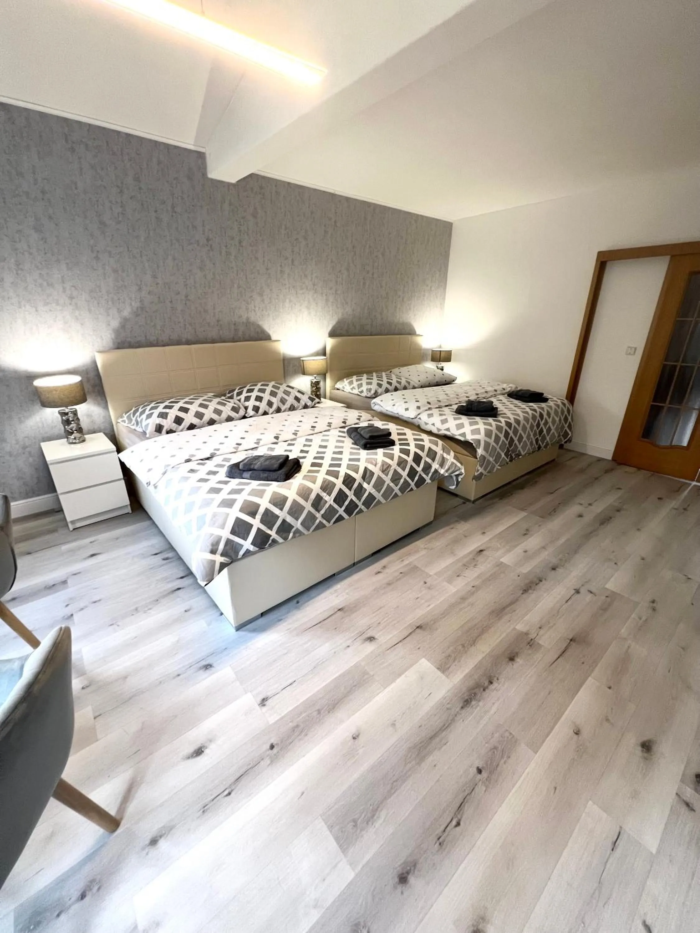 Bed in GrandLux Villa & Spa