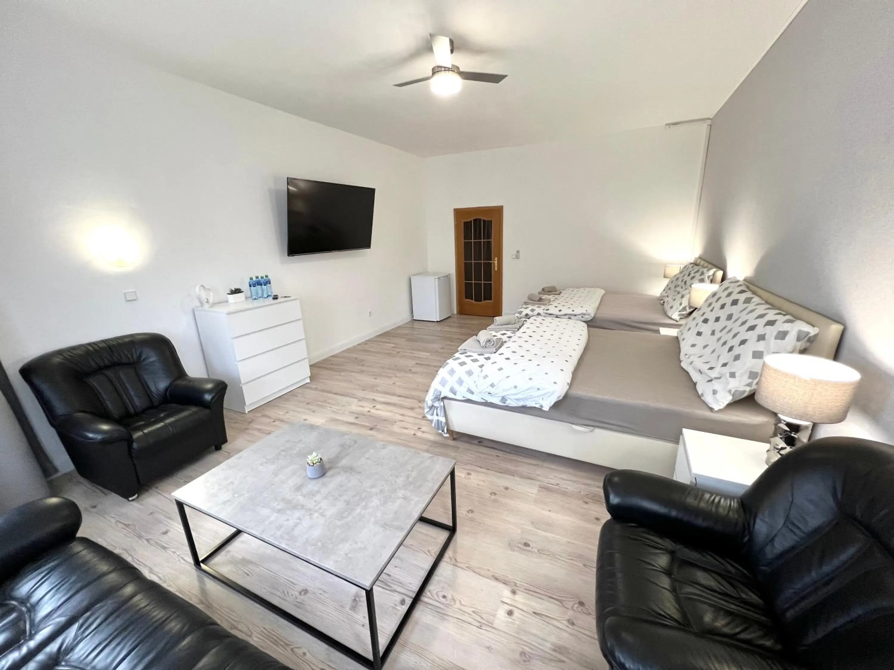 Bed in GrandLux Villa & Spa